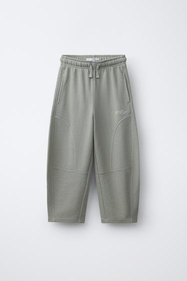 BARREL TROUSERS WITH CUT-OUTS, GARMENT DYE - Mid-ecru by Zara