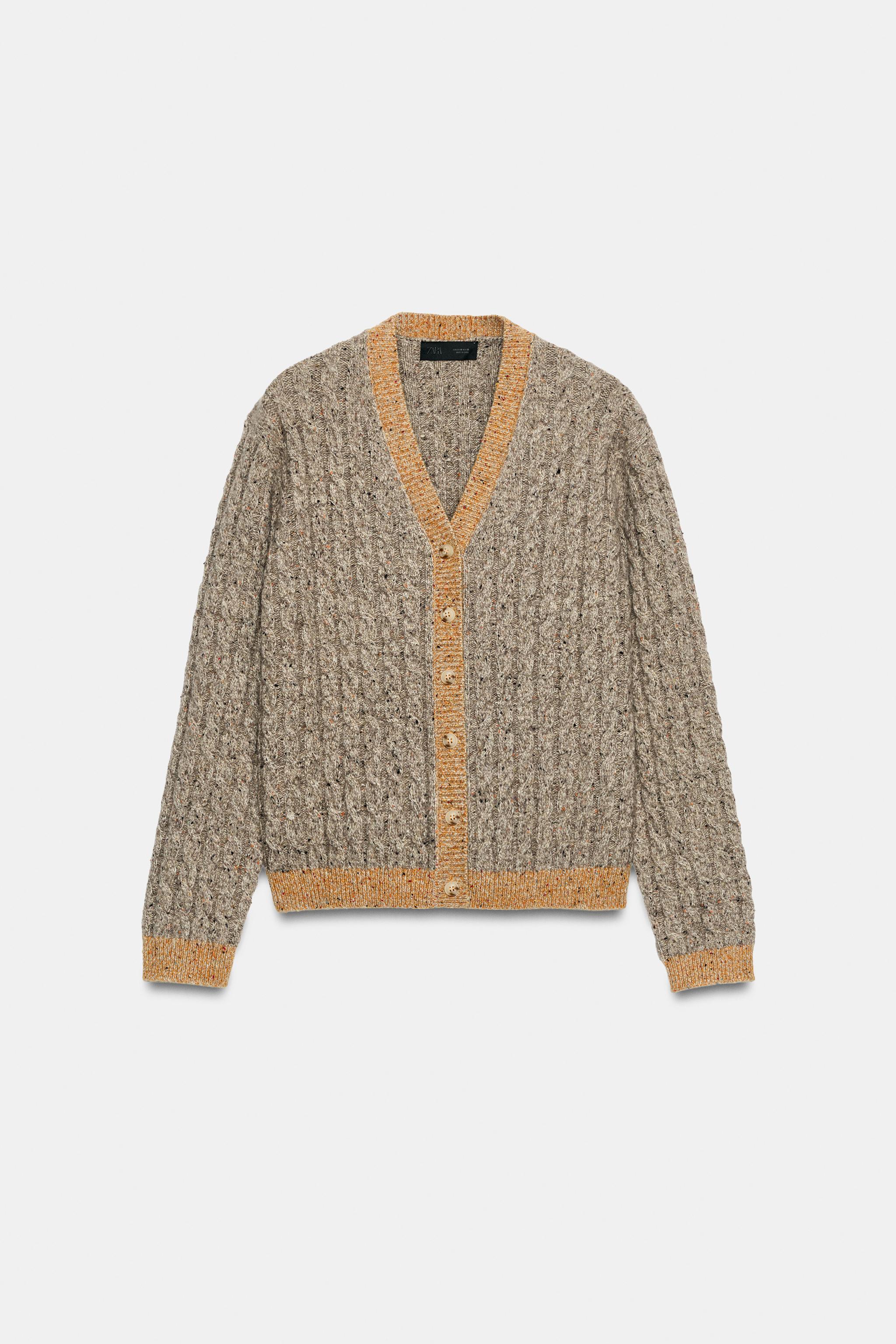 GILET AVEC LAINE TORSADES