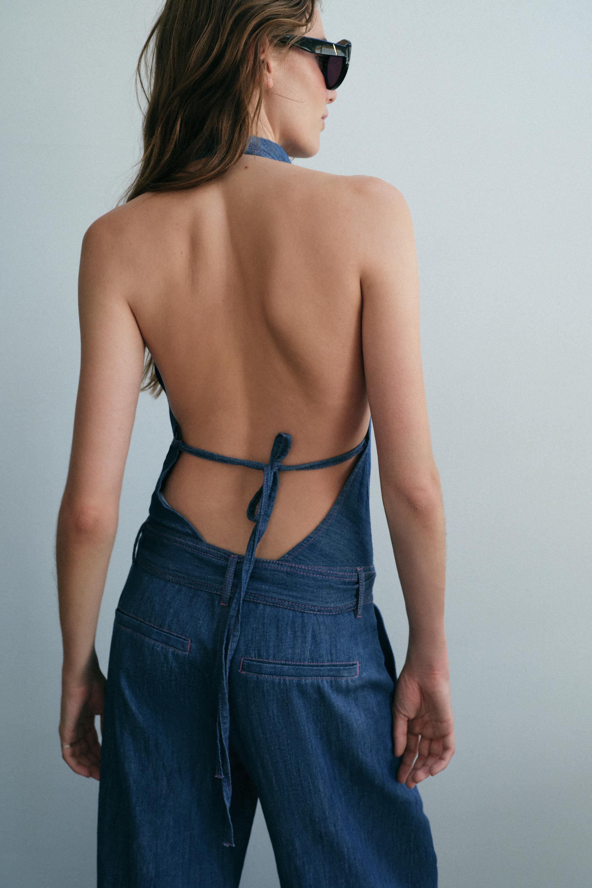 OPEN BACK BELTED HALTER JUMPSUIT