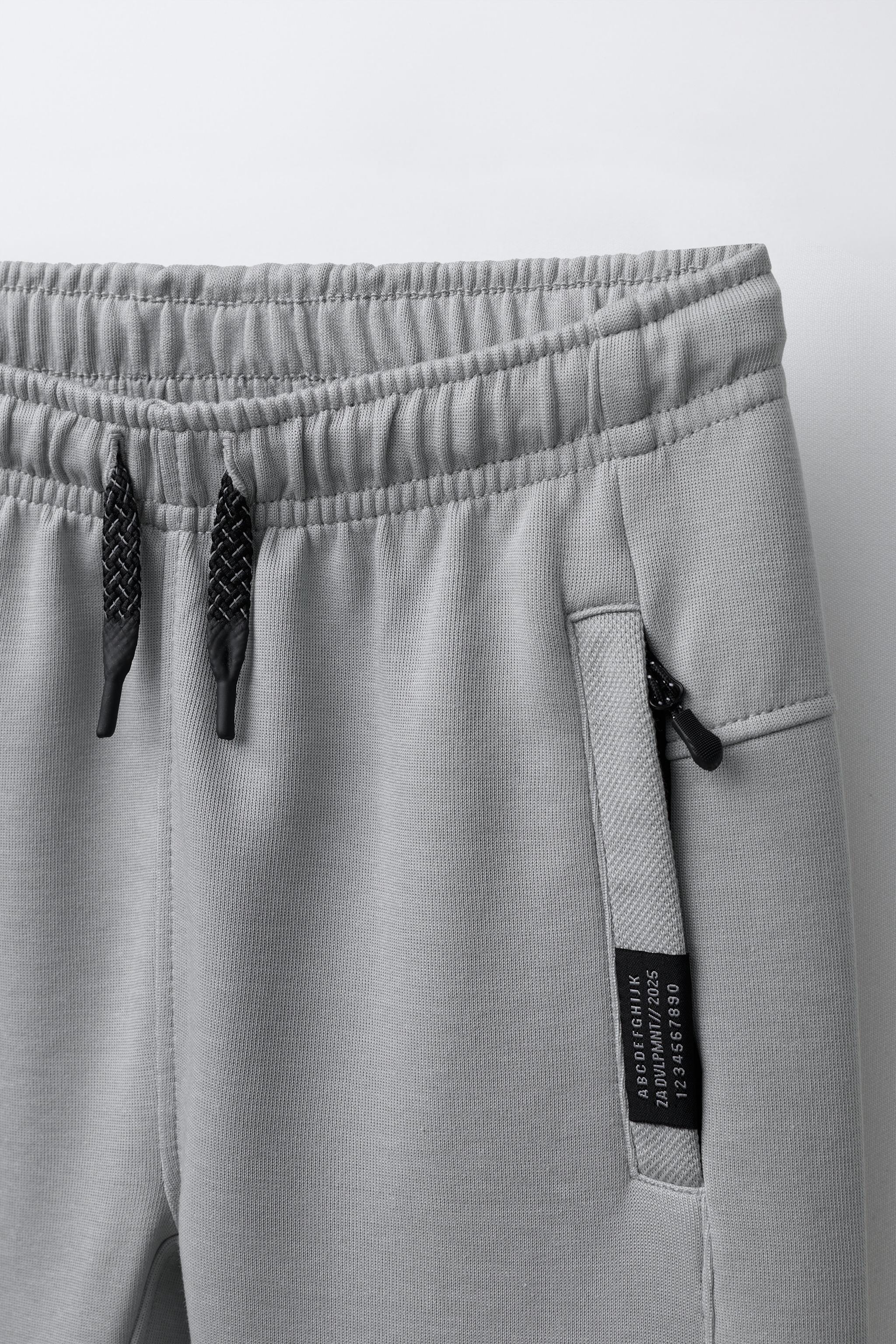 PANTALON EN MOLLETON INTERLOCK ET PIQUÉ