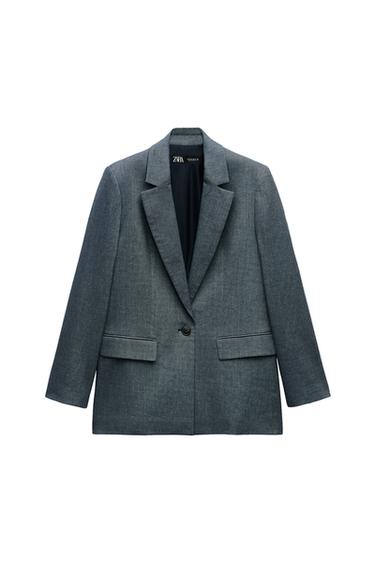 Front view of gray blazer with lapel and front flap pockets.