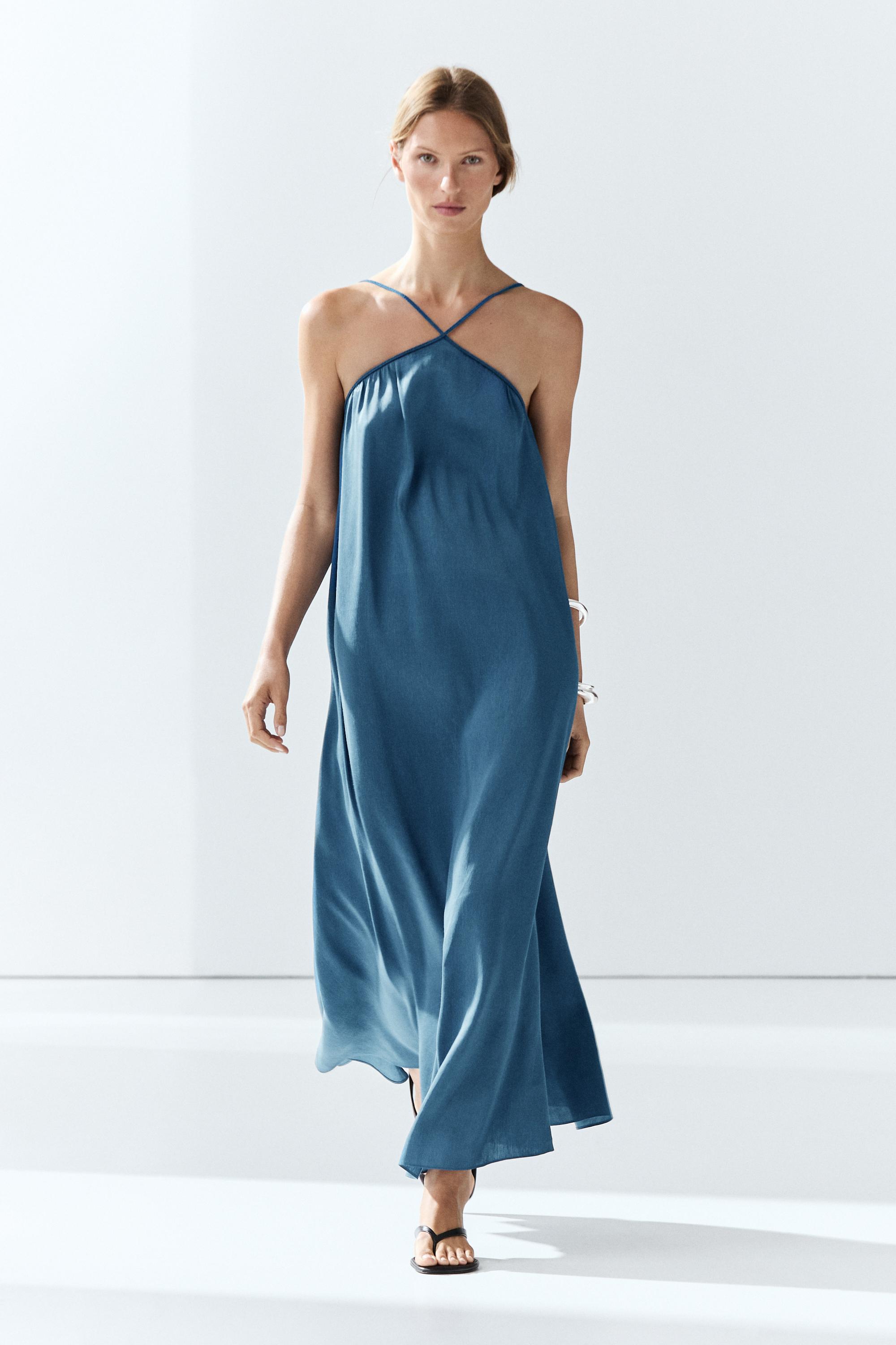 Long flowing dress with criss-cross straps