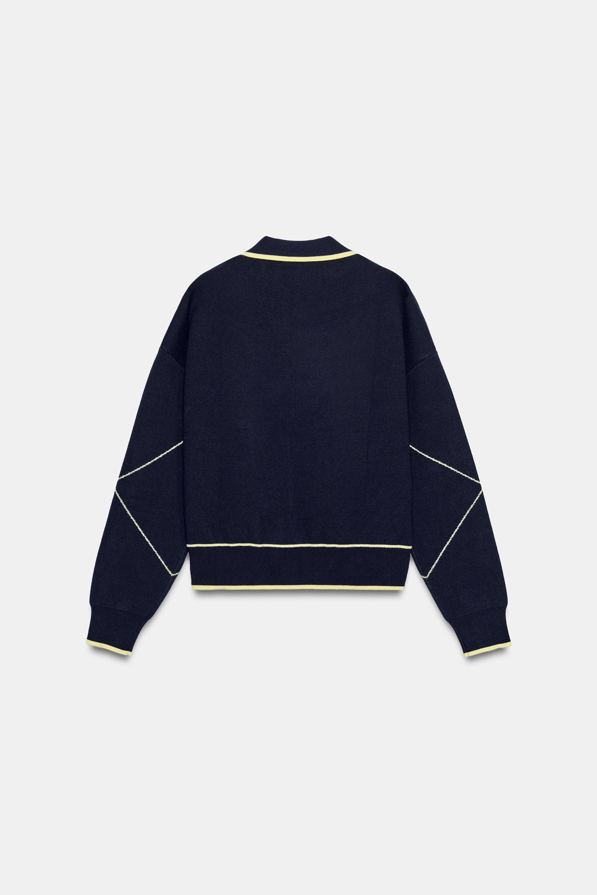 PULL POLO EN MAILLE LISERÉS CONTRASTE