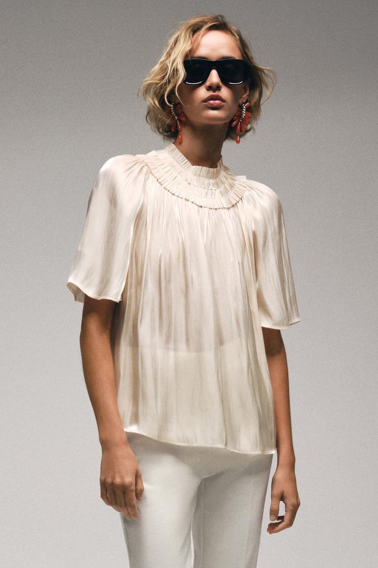Blusa con efecto brillo 4
