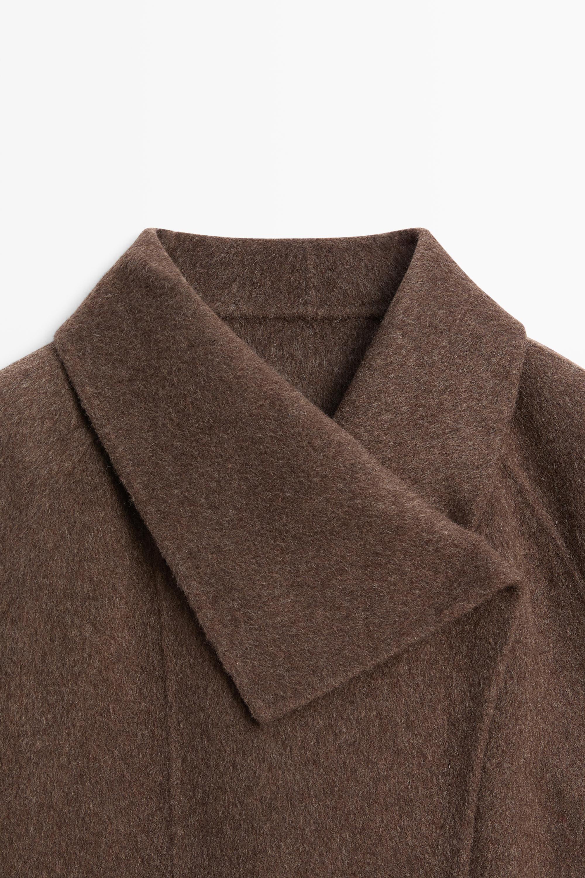 Short wool blend coat with side fastening