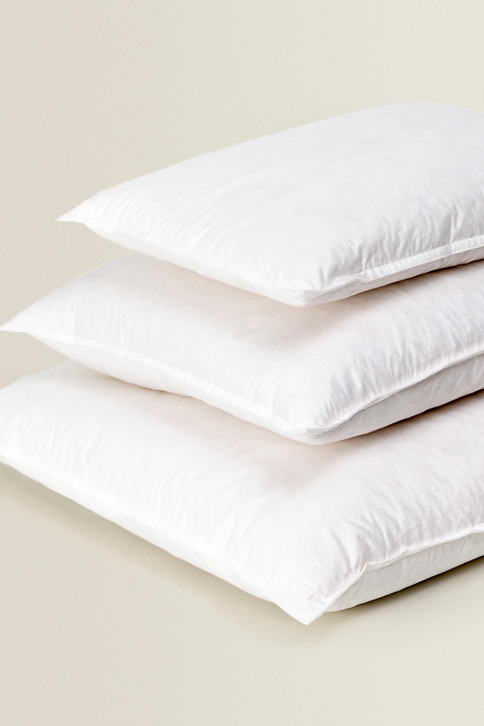 Zara white shop feather cushion