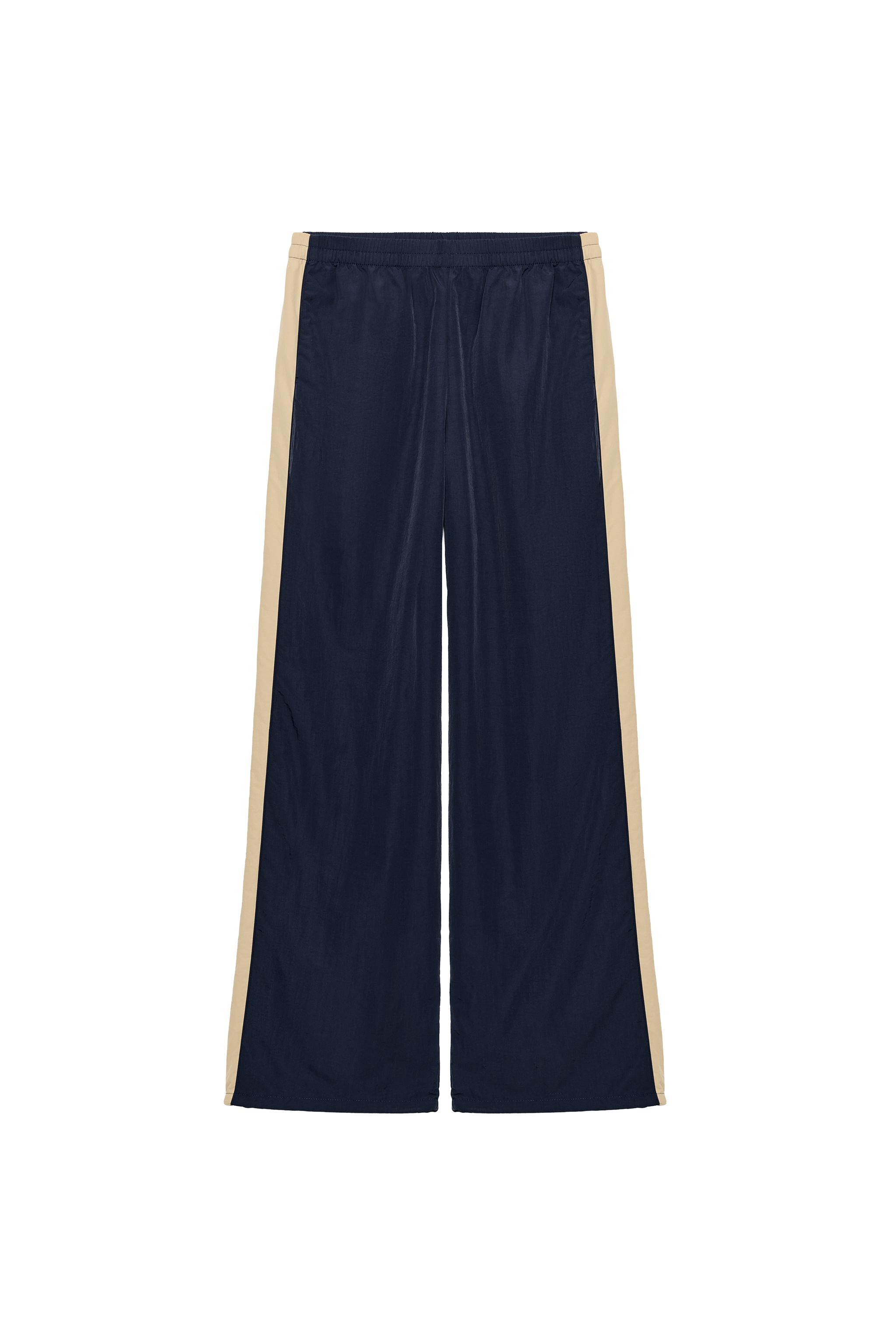 PANTALÓN NYLON BANDAS LATERALES