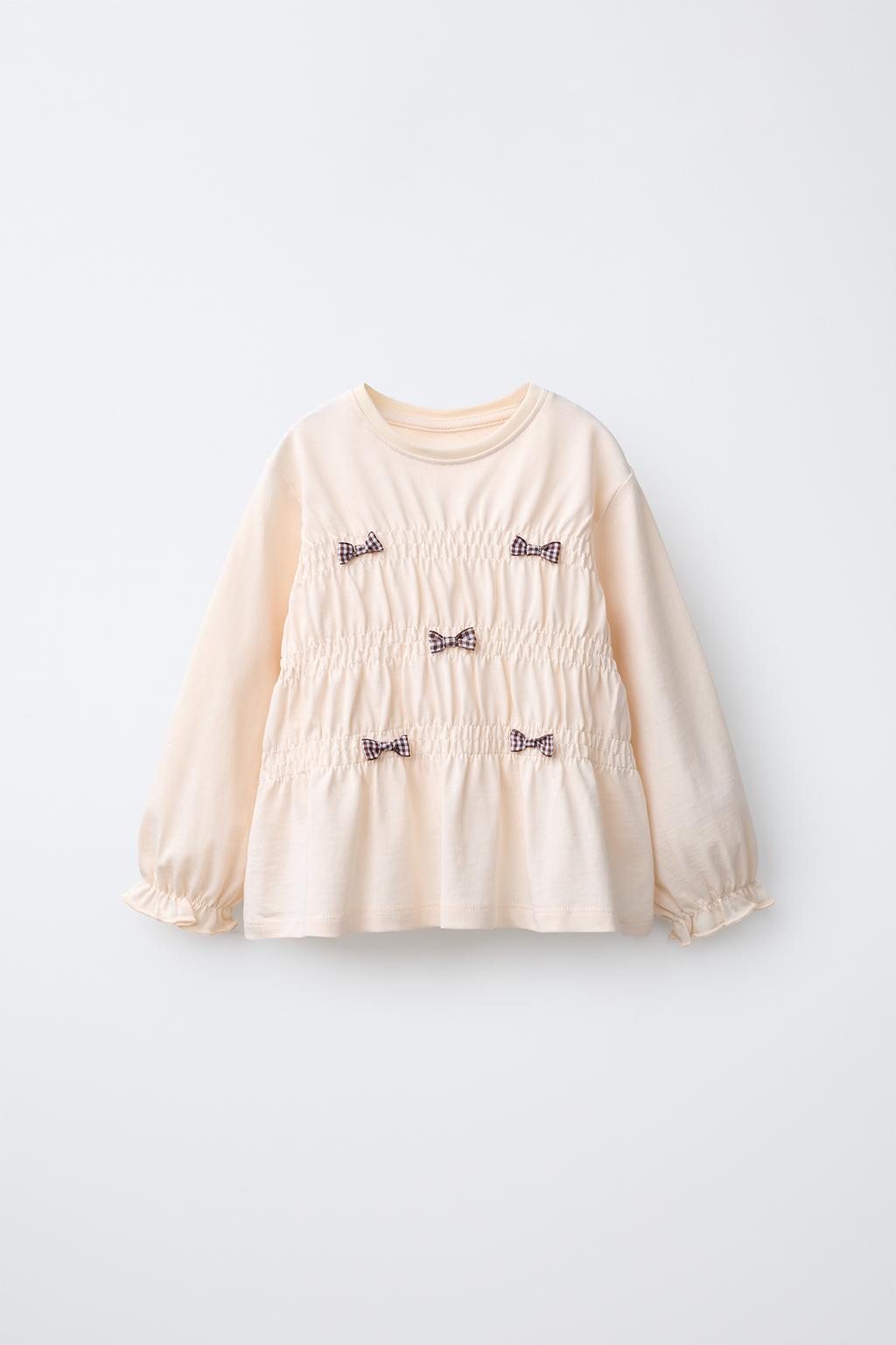 GATHERED T-SHIRT WITH BOWS
