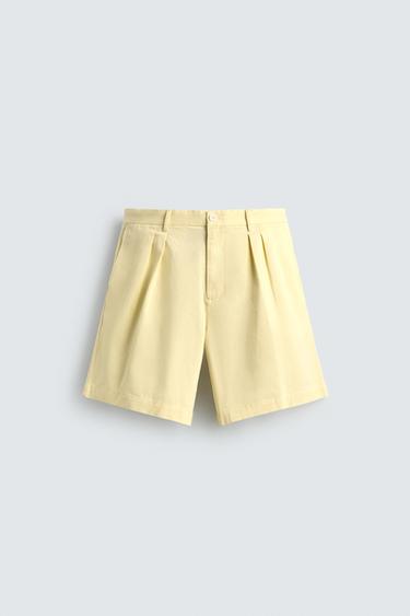RELAXED FIT PLEATED BERMUDA SHORTS - Light yellow by Zara