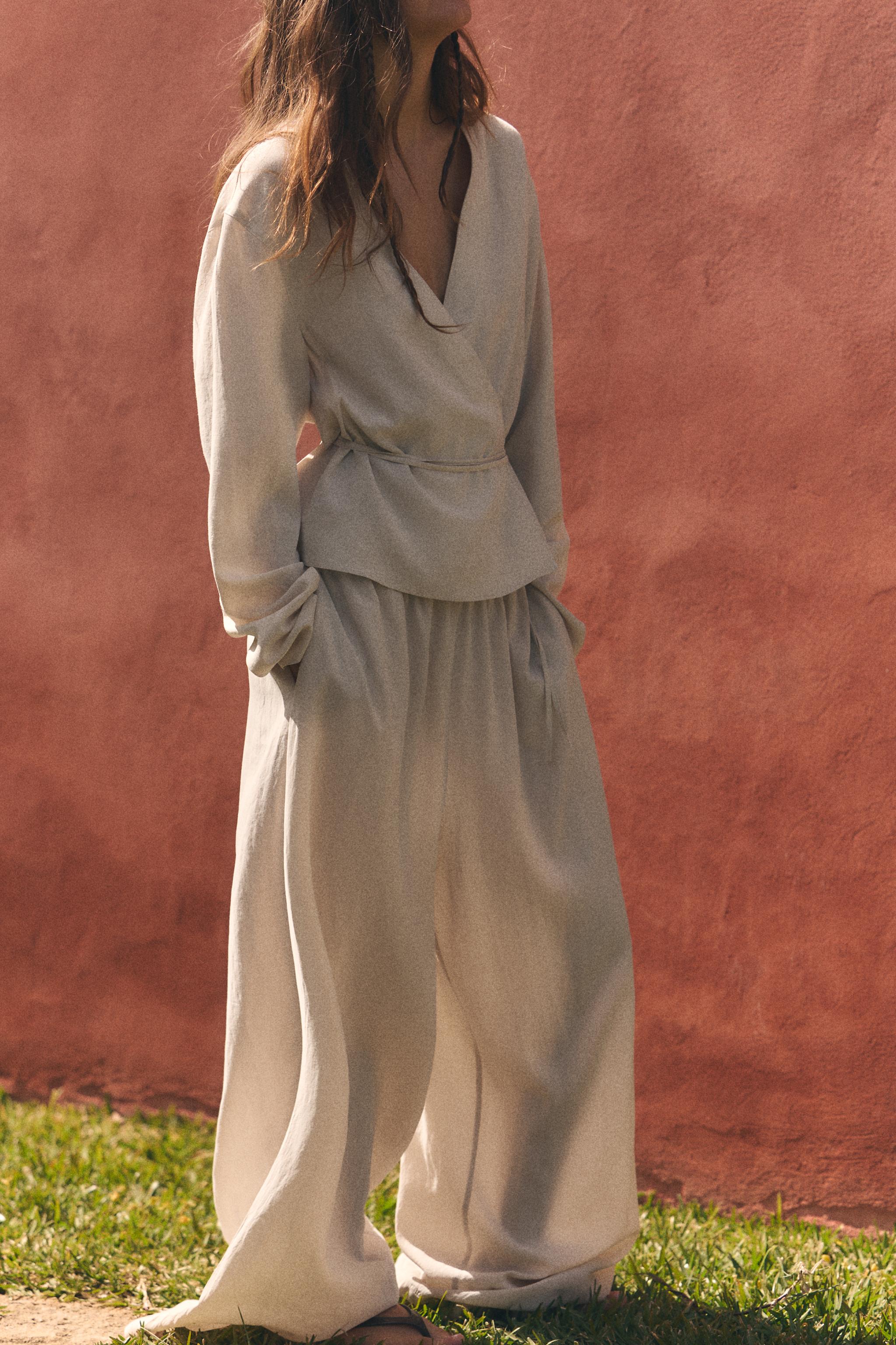 PALAZZO TROUSERS WITH TIE DETAIL