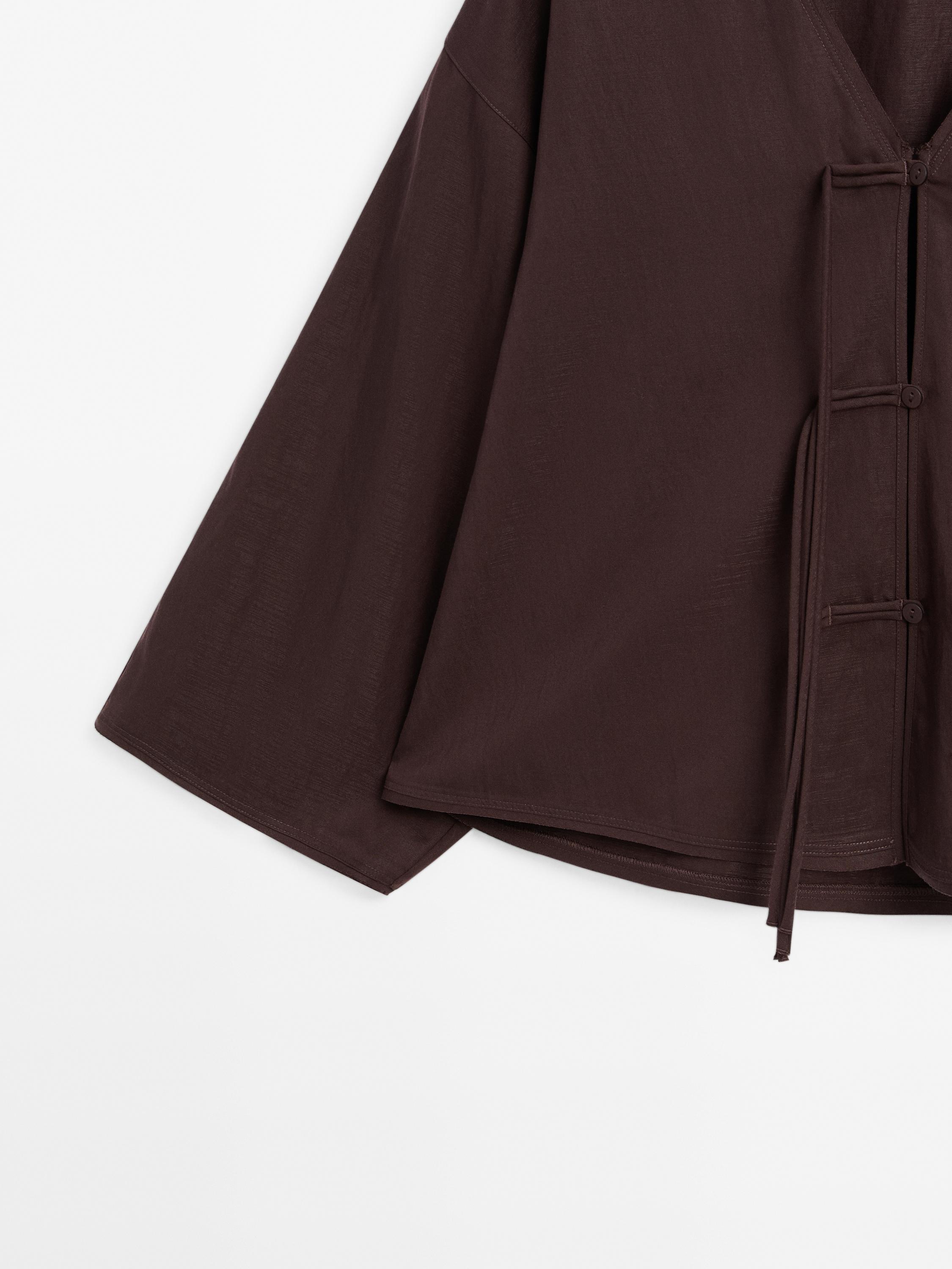 Cropped shirt with drawstring detail