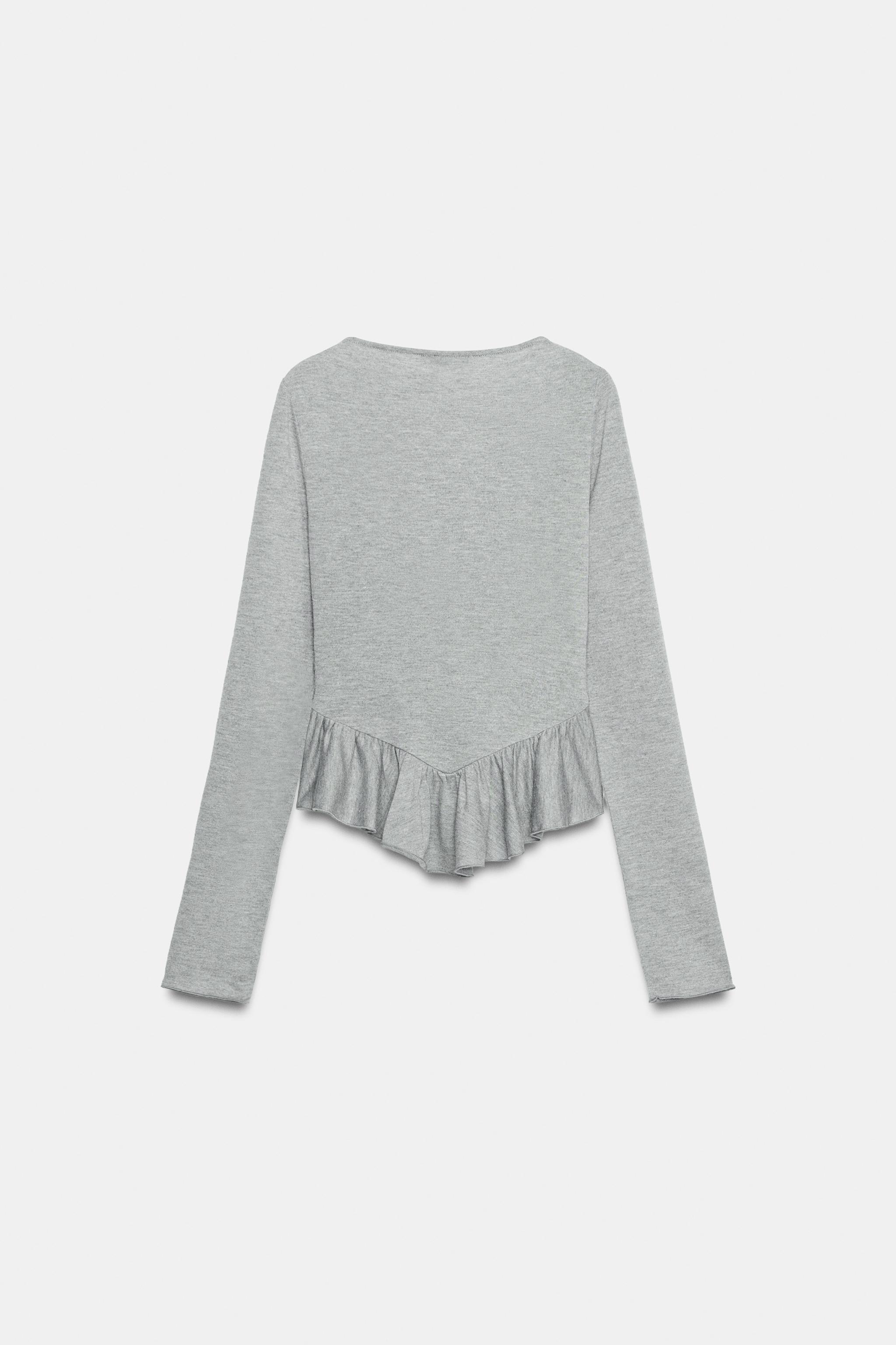SMOCKED PEPLUM TOP