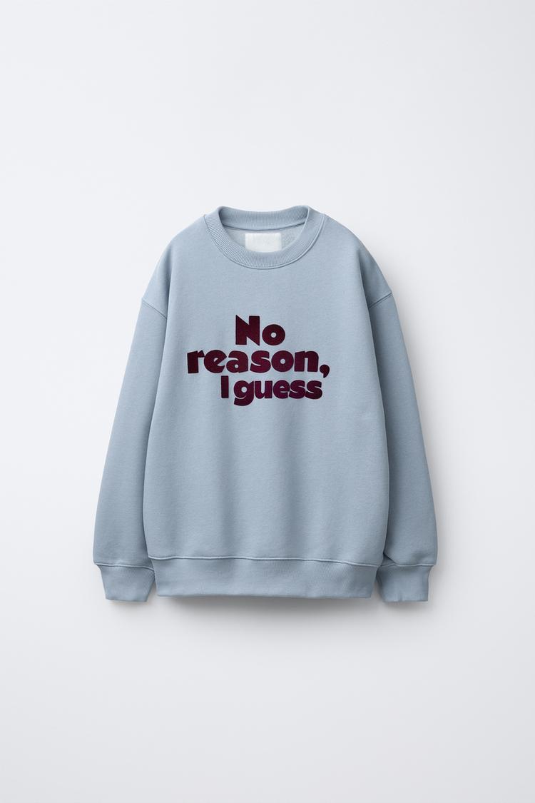 FLOCKED SLOGAN SWEATSHIRT