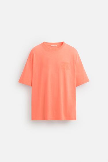 CAMISETA TEXTO BORDADO - Naranja flúor de Zara