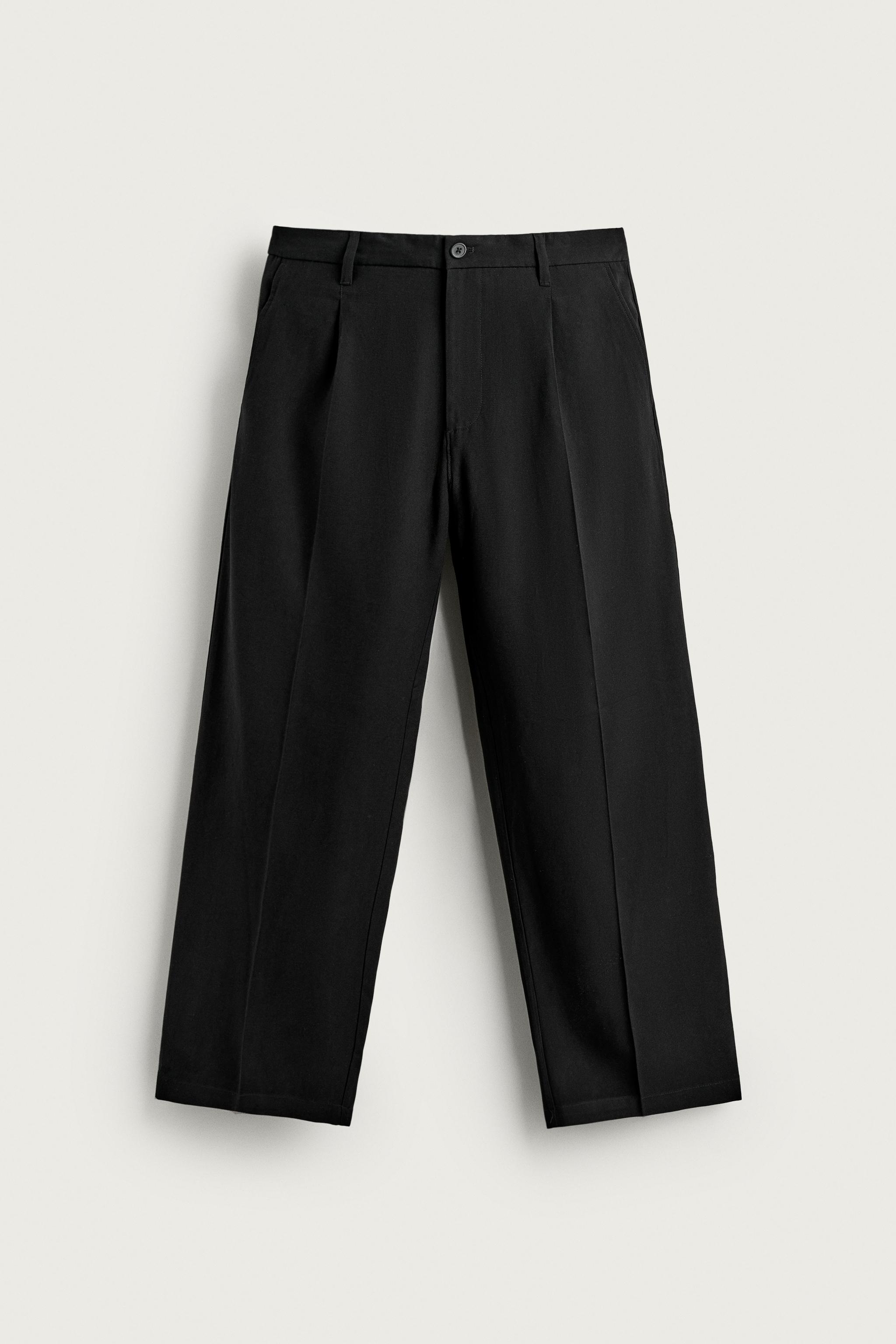 FLOWY RELAXED FIT PLEATED PANTS — Black
