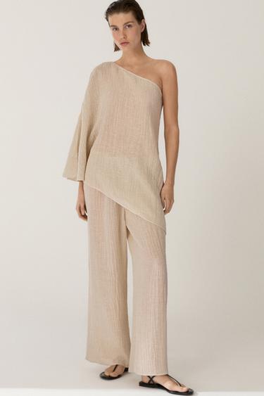 Pantalon fluide gaufré en lin mélangé - Beige chiné de Zara