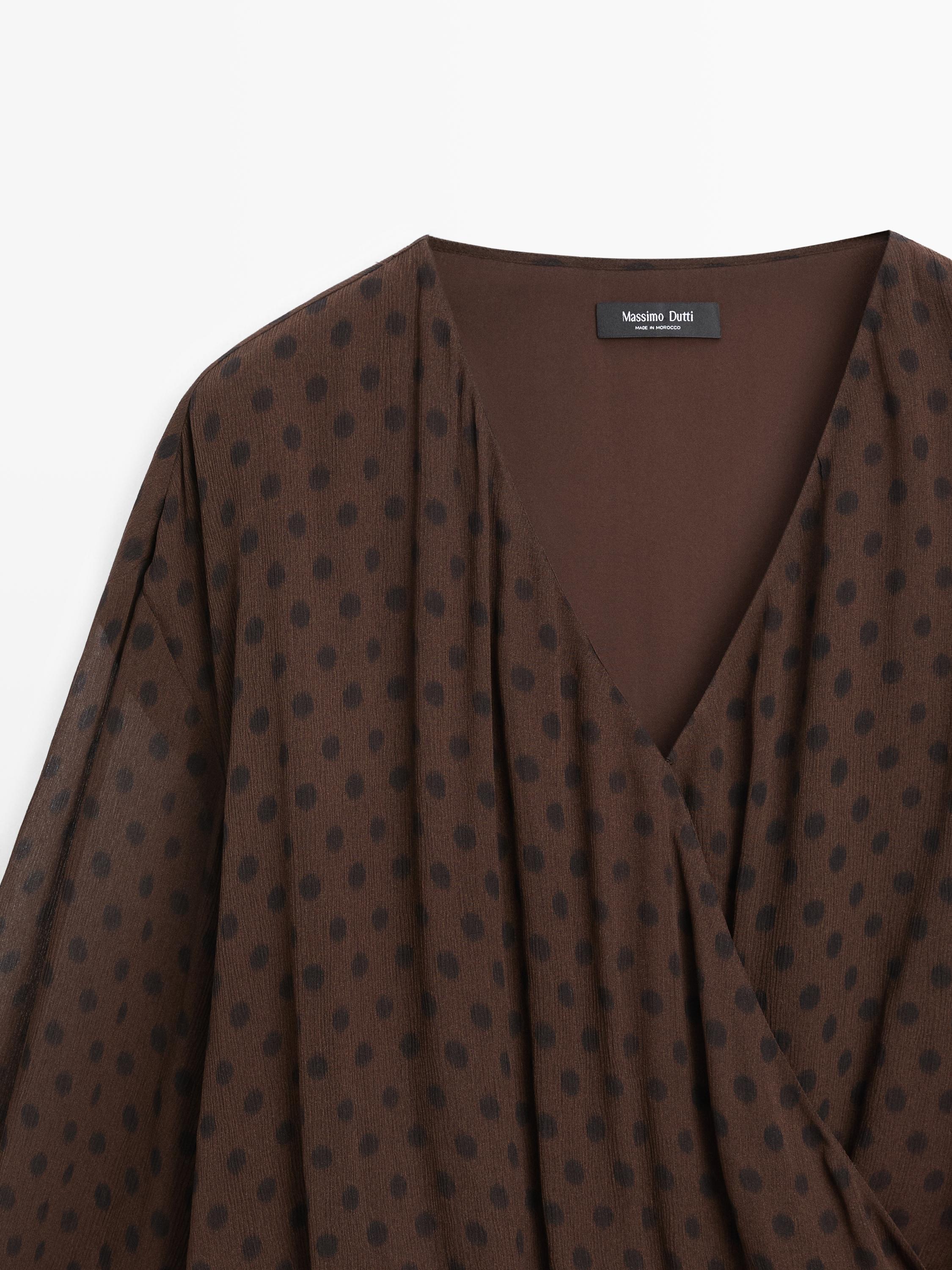 Flowing surplice polka dot blouse