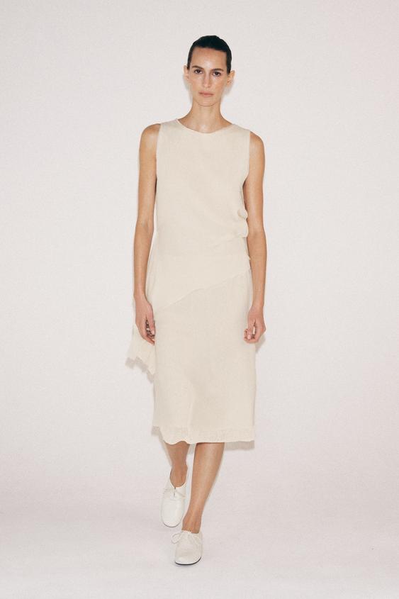 ASYMMETRIC SLEEVELESS TOP