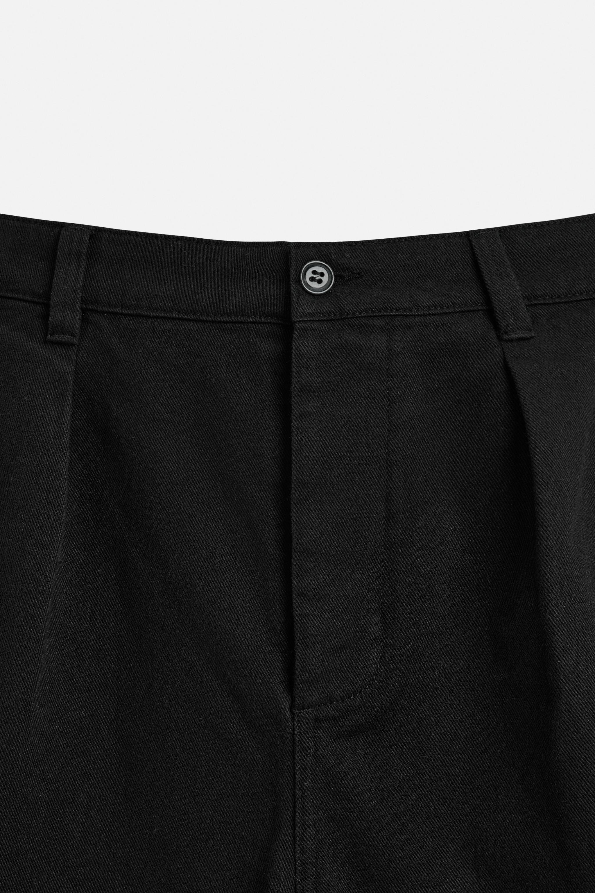 RELAXED FIT PLEATED BERMUDA SHORTS
