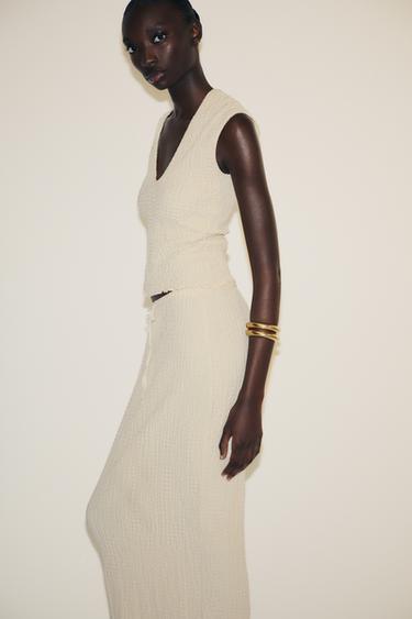 تنورة ميدي بملمس - أصفر فاتح الخاص بـ Zara