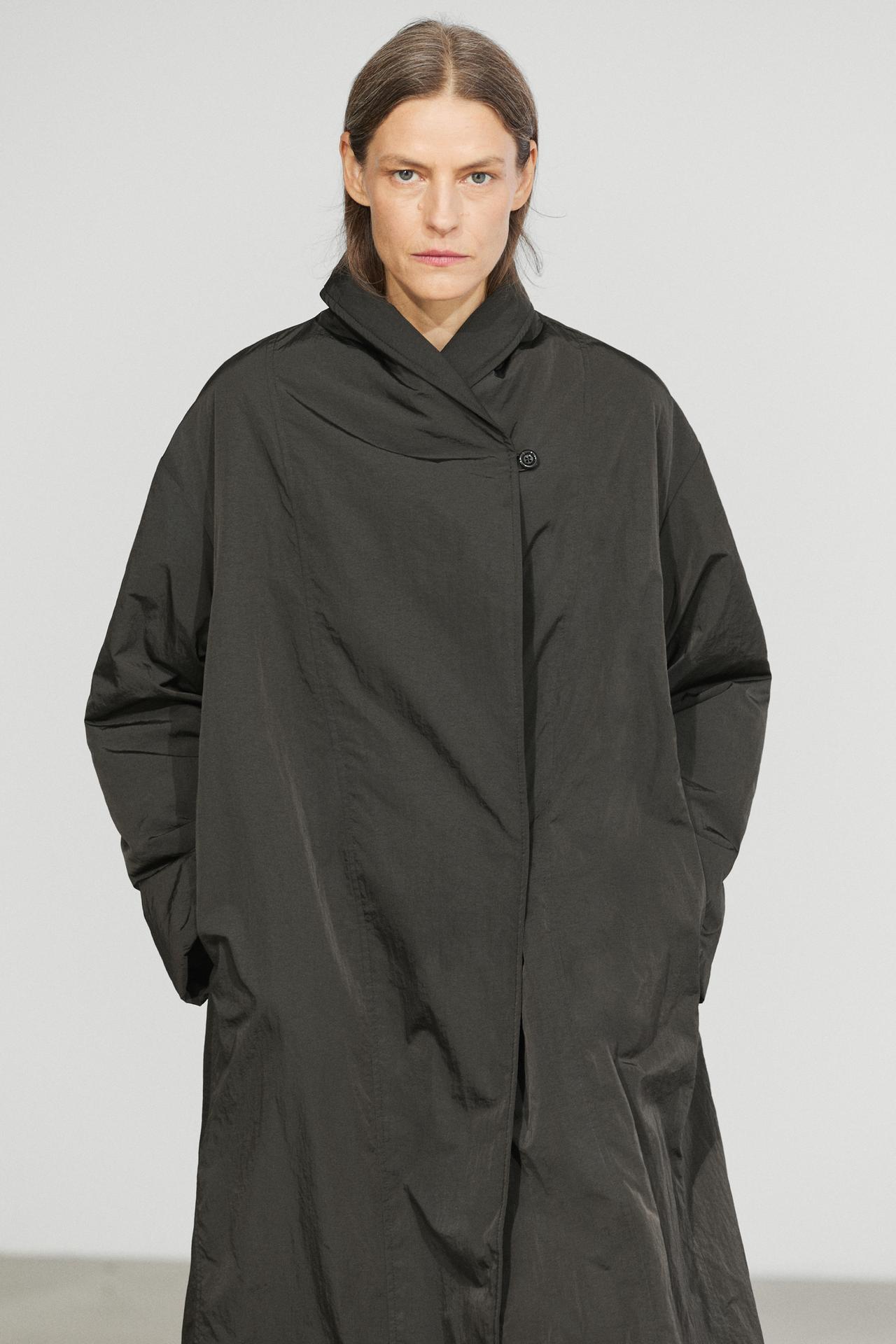 Long quilted parka — Black gold