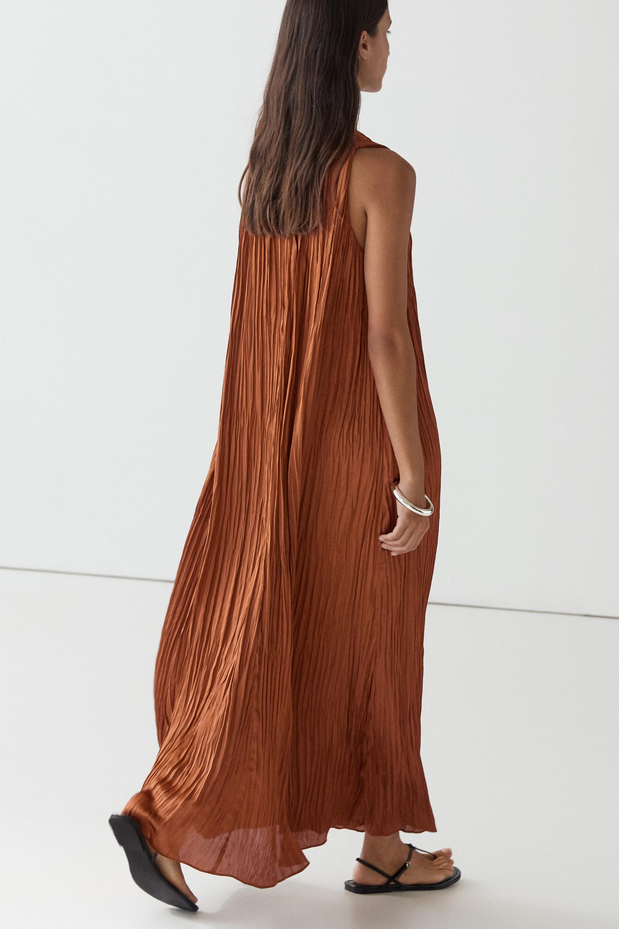 Long pleated halterneck dress