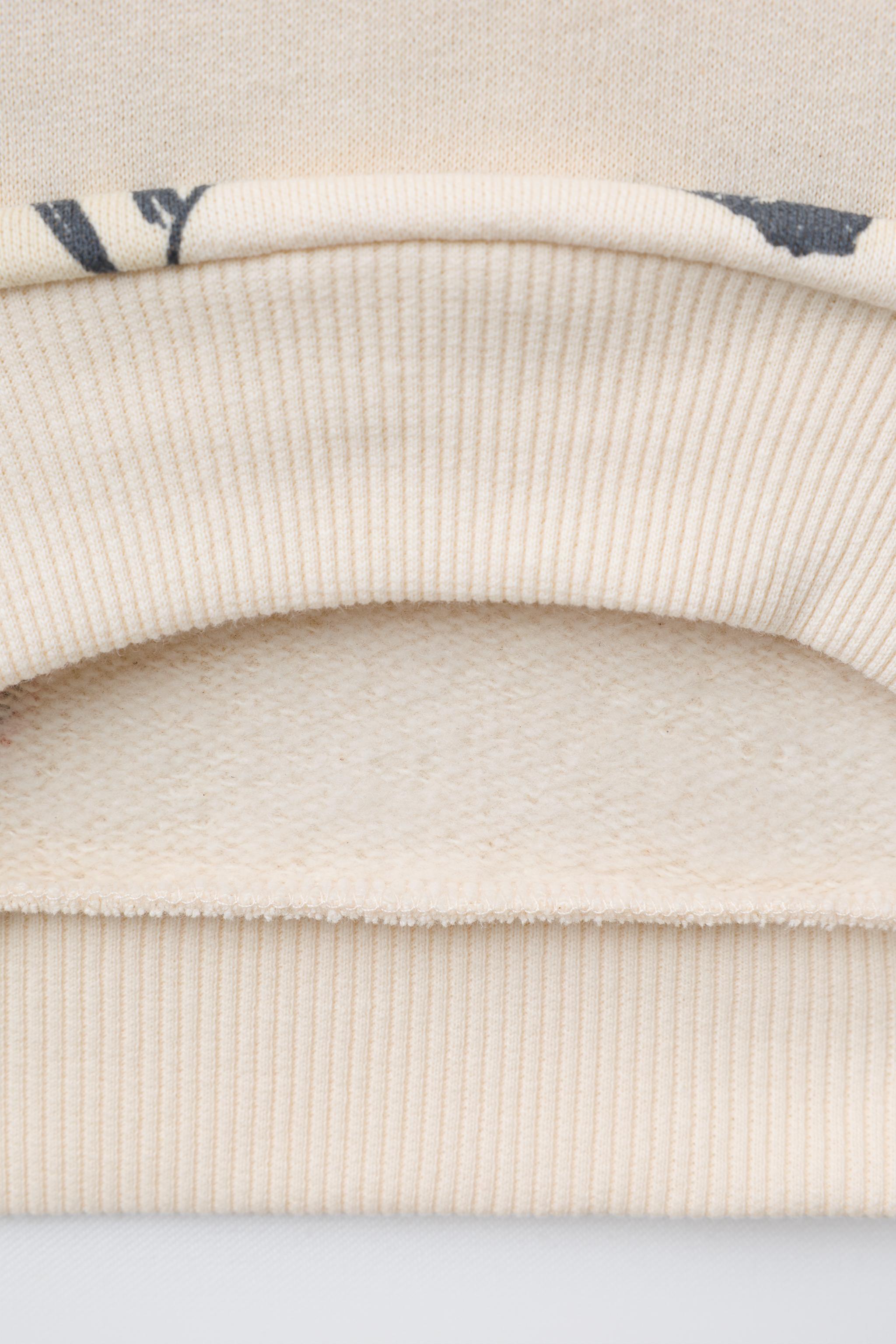 JOGGING SET: SWEATSHIRT AND ANIMAL PRINT JOGGER PANTS