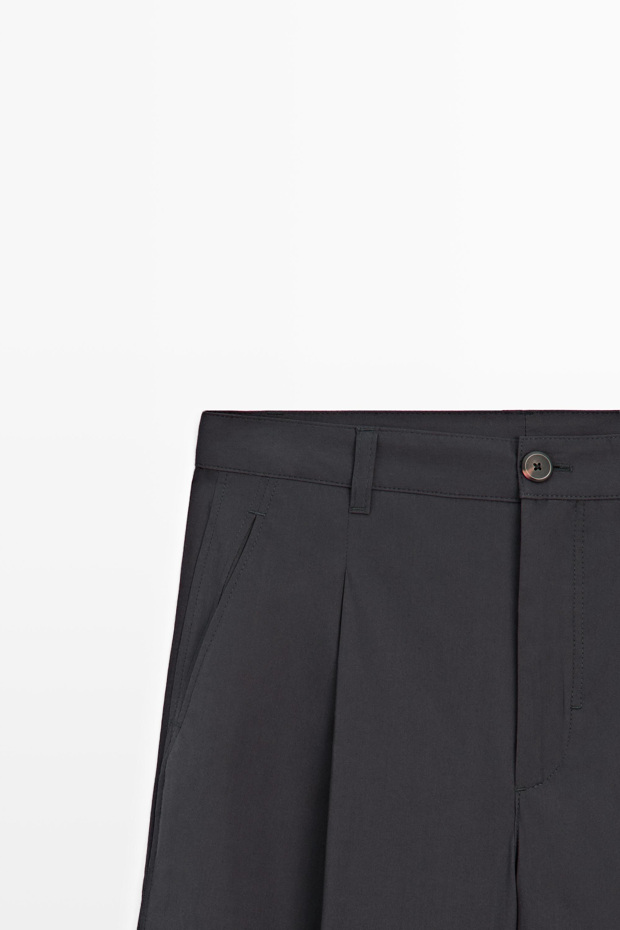 Cotton blend wide-leg pleated trousers