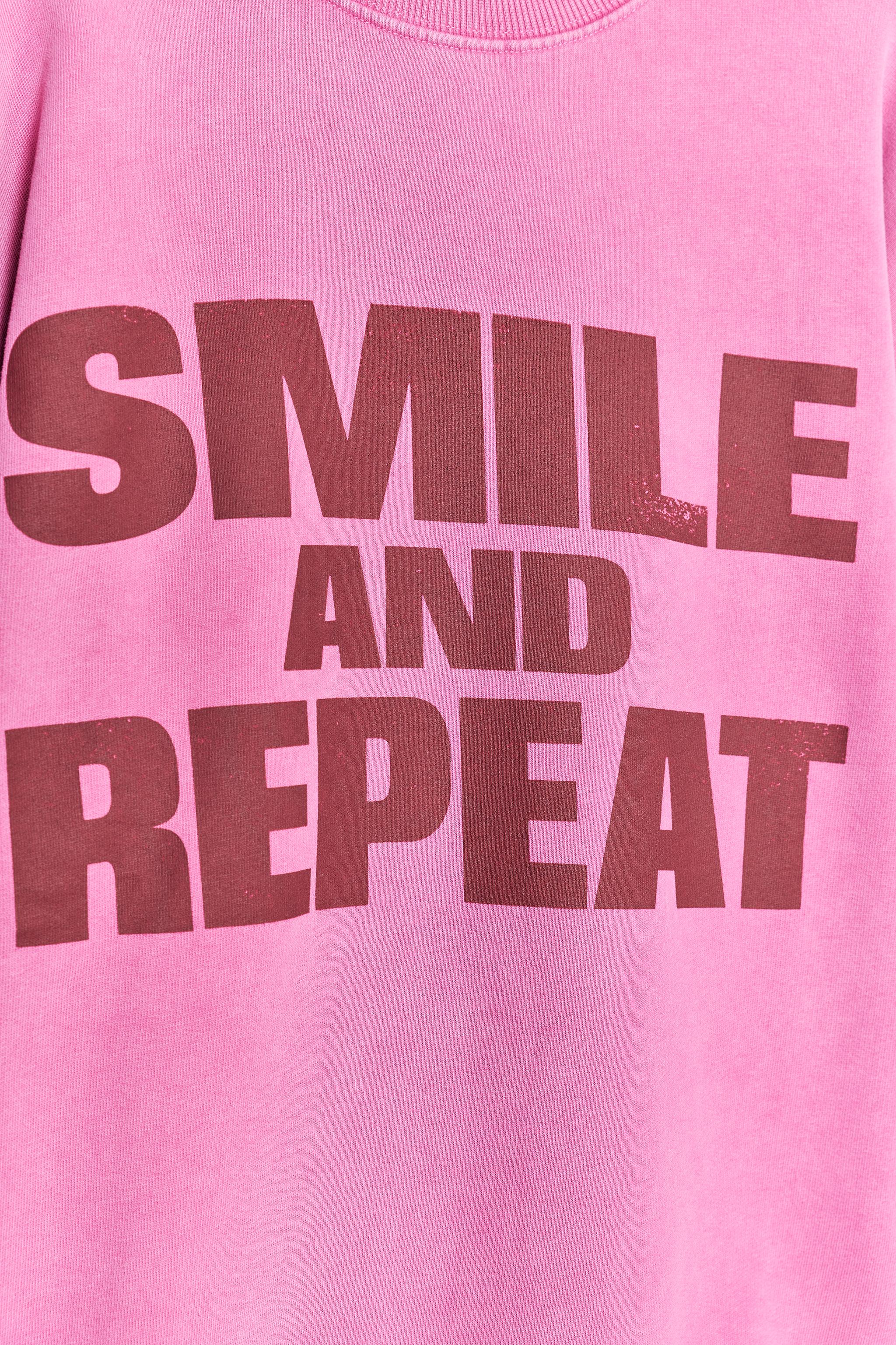 SWEAT DÉLAVÉ SMILEY®