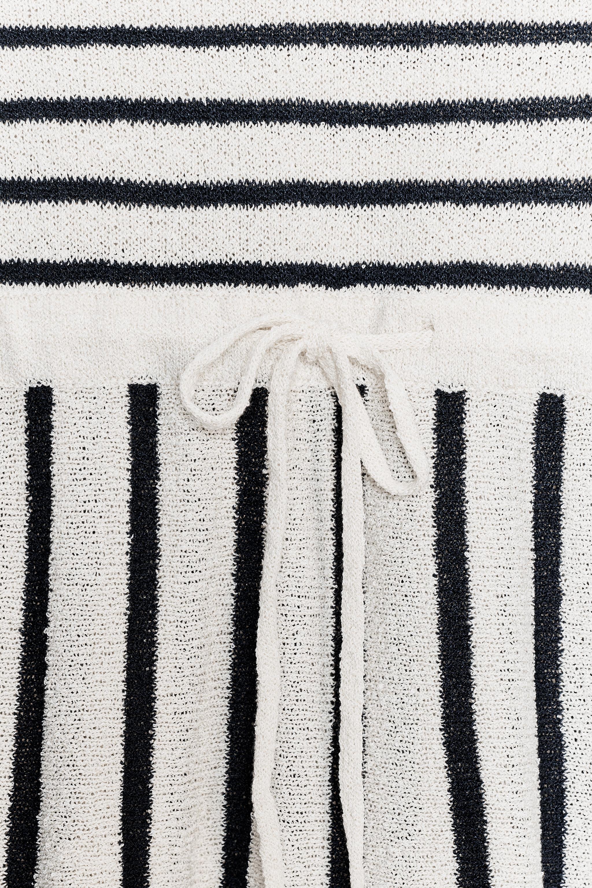 STRIPED CUT-OUT KNIT DRESS