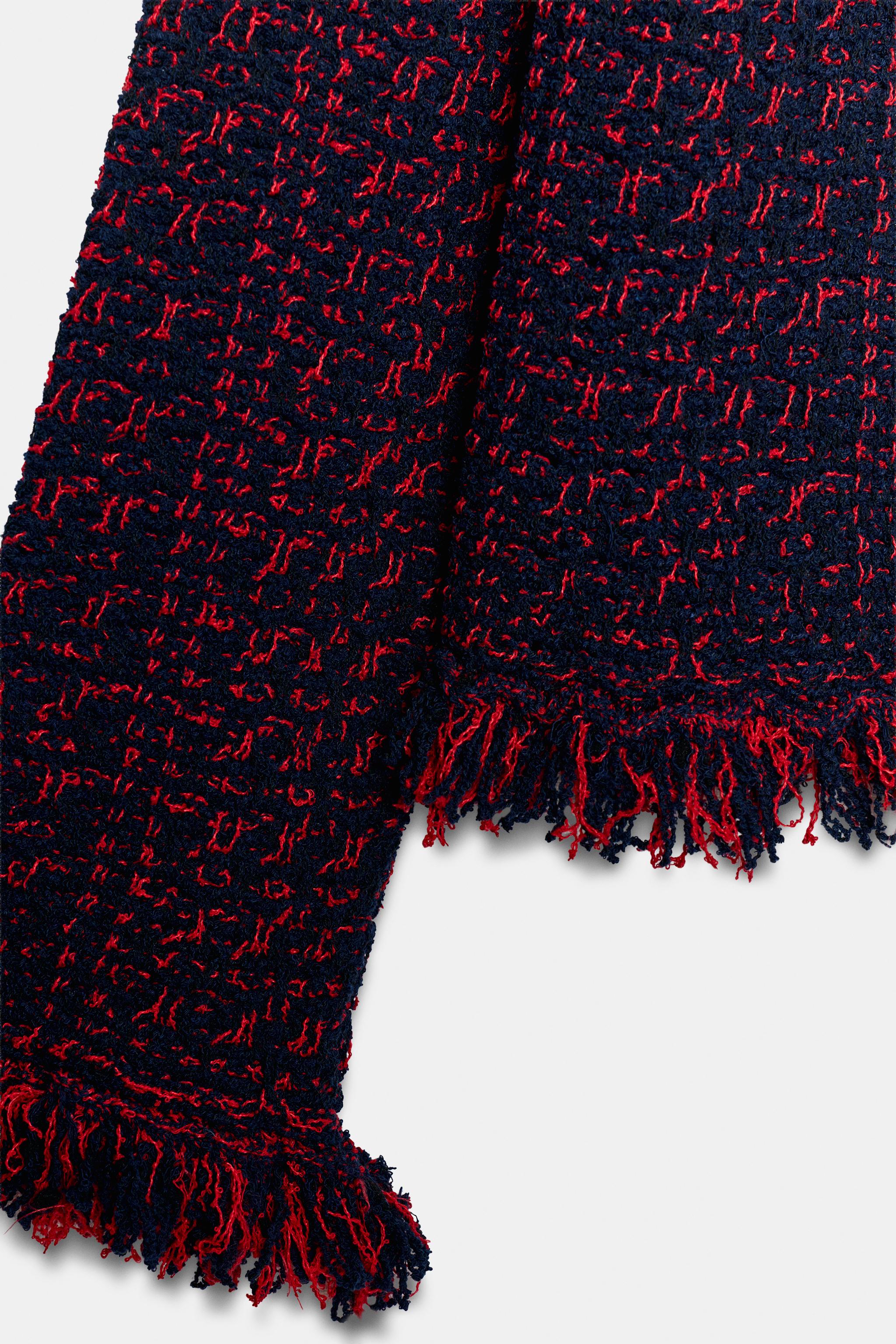 VESTE EN MAILLE STRUCTURÉE EFFRANGÉE