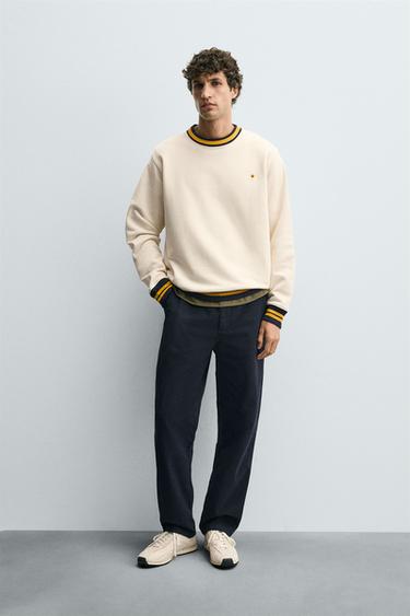 SWEATSHIRT WITH CONTRAST EMBROIDERY AND RIBBING - Oyster-white by Zara