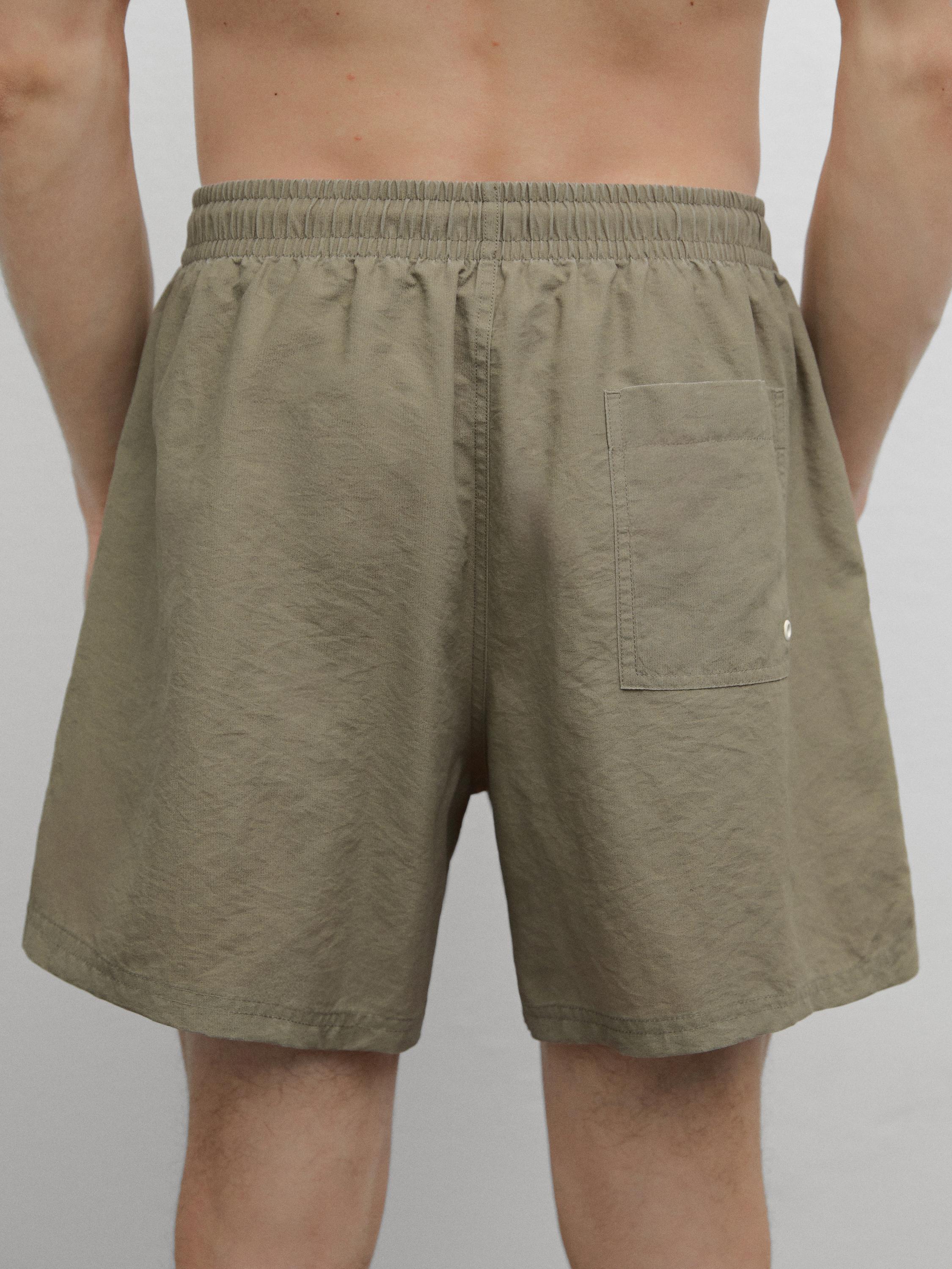 Plain regular fit swimming trunks
