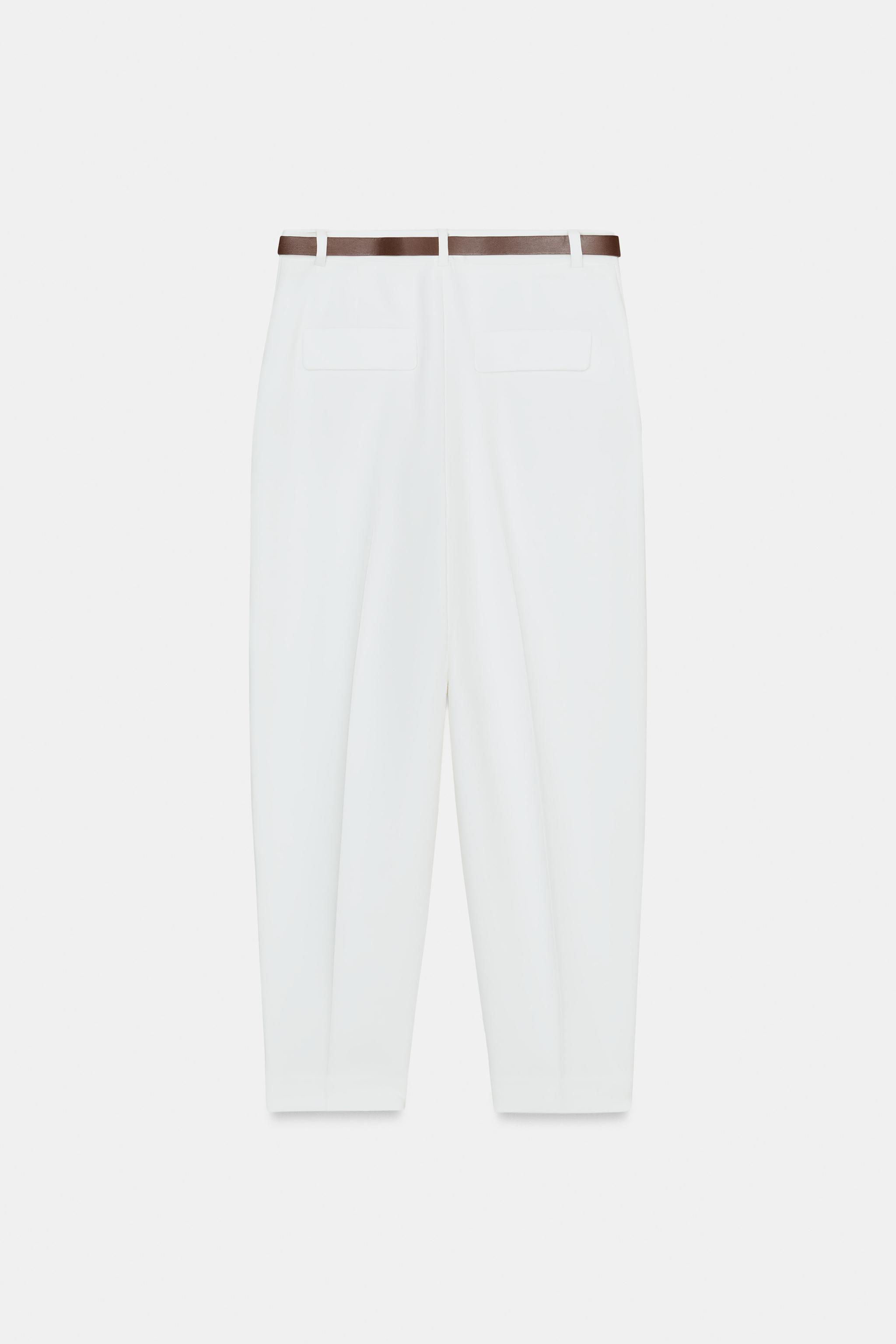 PANTALON À PINCES ET CEINTURE
