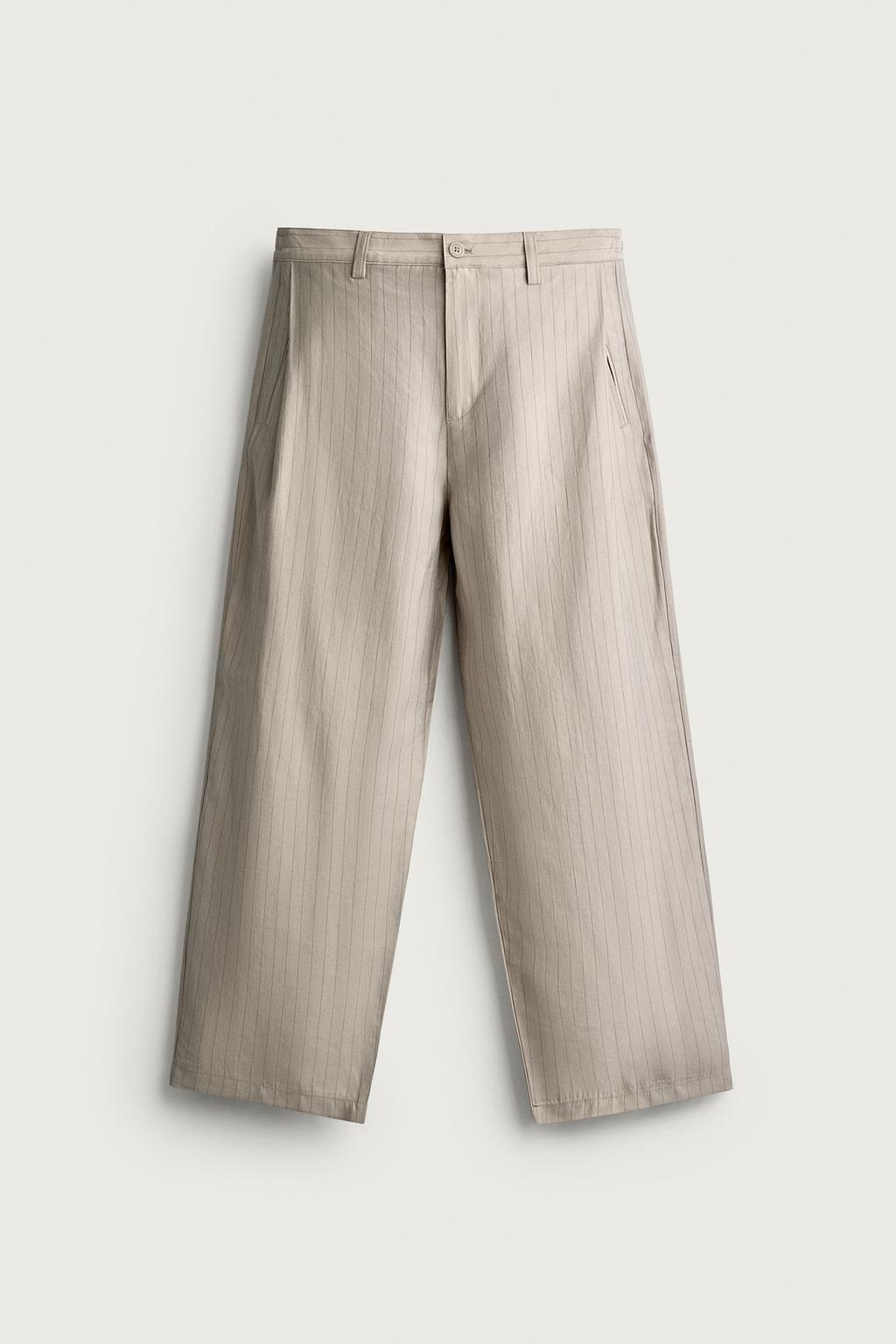 FLOWING TROUSERS WITH SIDE PLEATS