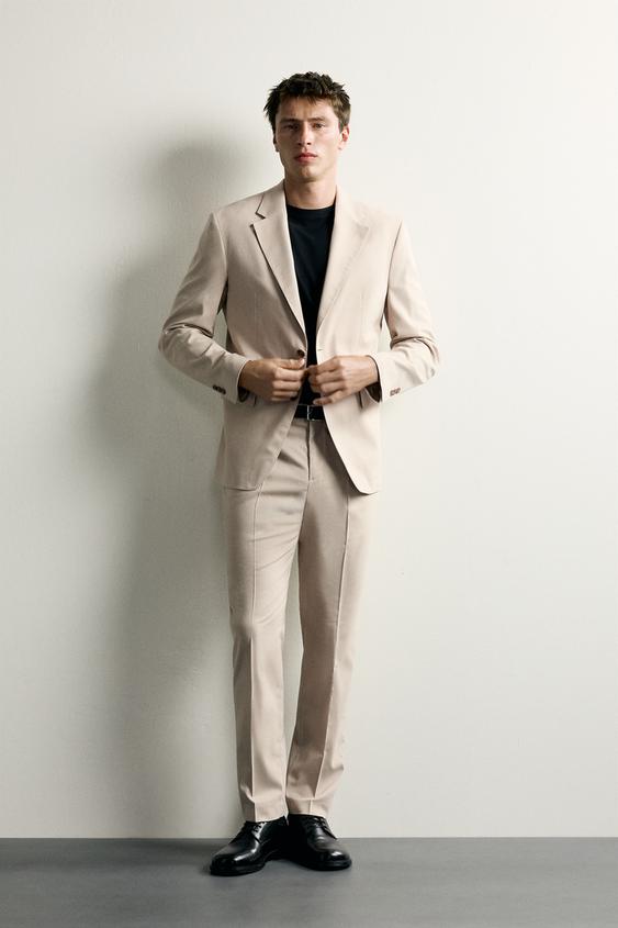 PANTALÓN REGULAR FIT TRAJE - Tostado de Zara - Imagen 0