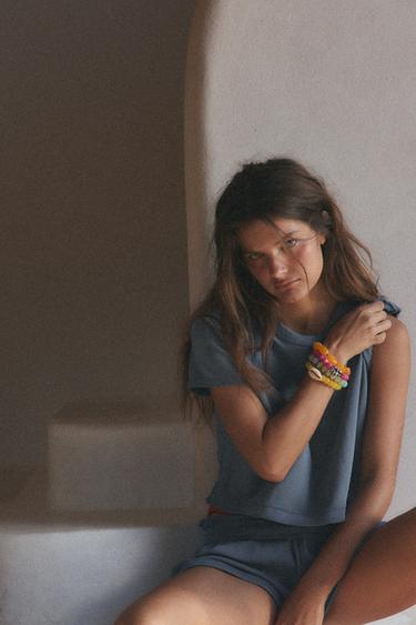 حزمة من 4 أساور بكرات وصدف - متعدد الألوان الخاص بـ Zara