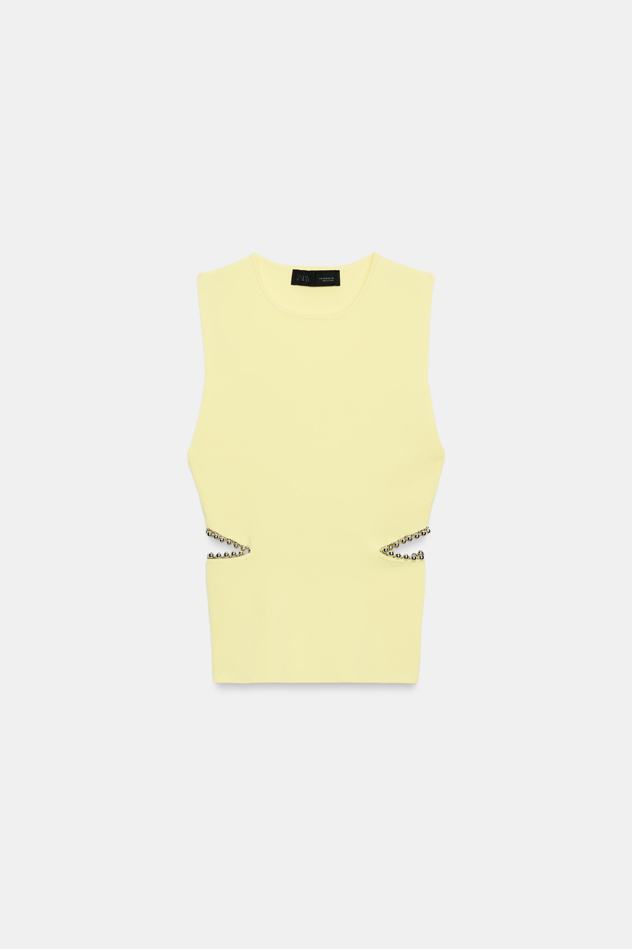 TOP EN MAILLE AJOURÉ AVEC PERLES