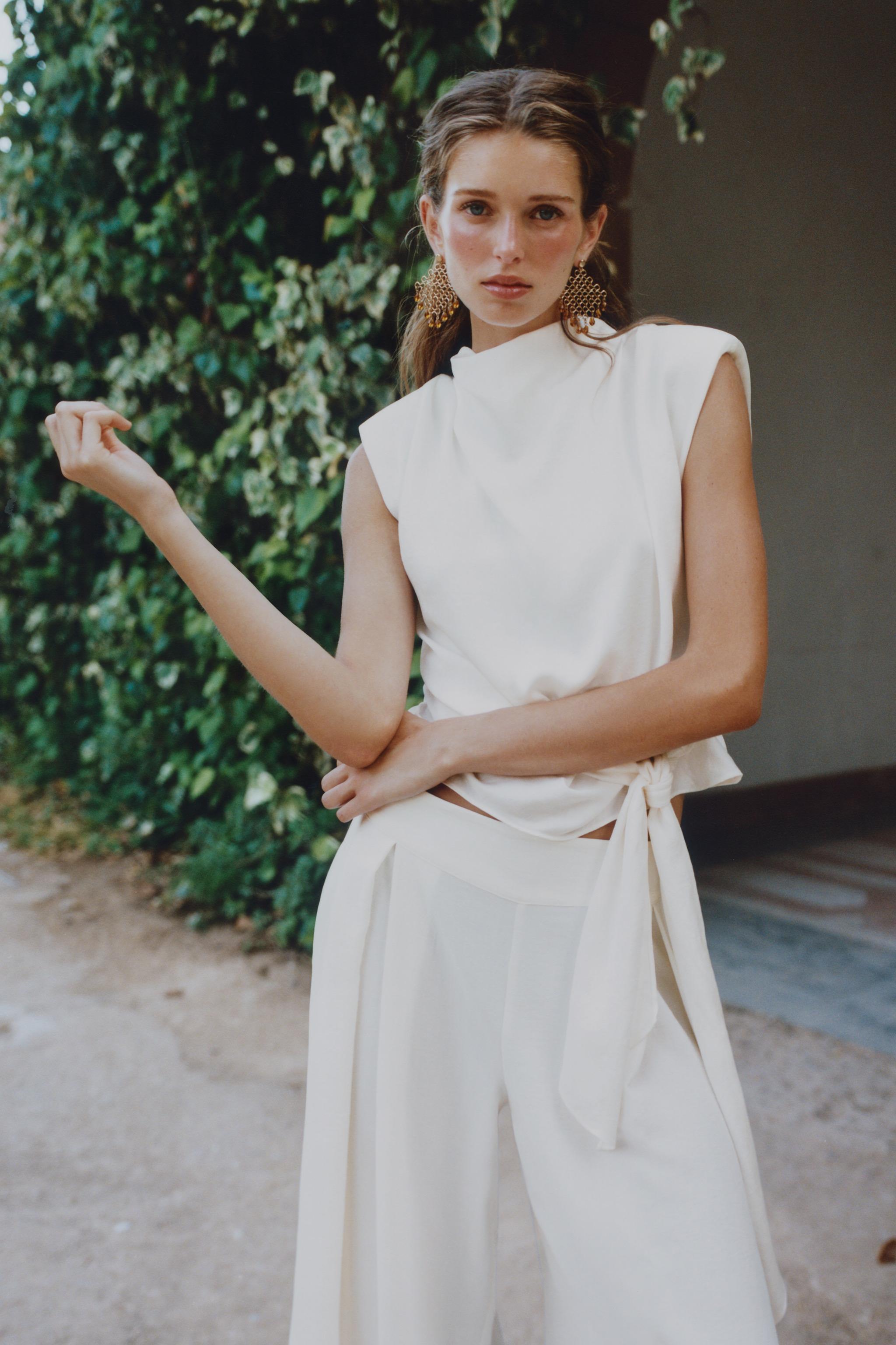KNOTTED SHOULDER PAD SATIN EFFECT TOP — Ecru