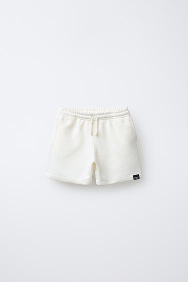 BERMUSA LISA ETIQUETA - Crudo de Zara