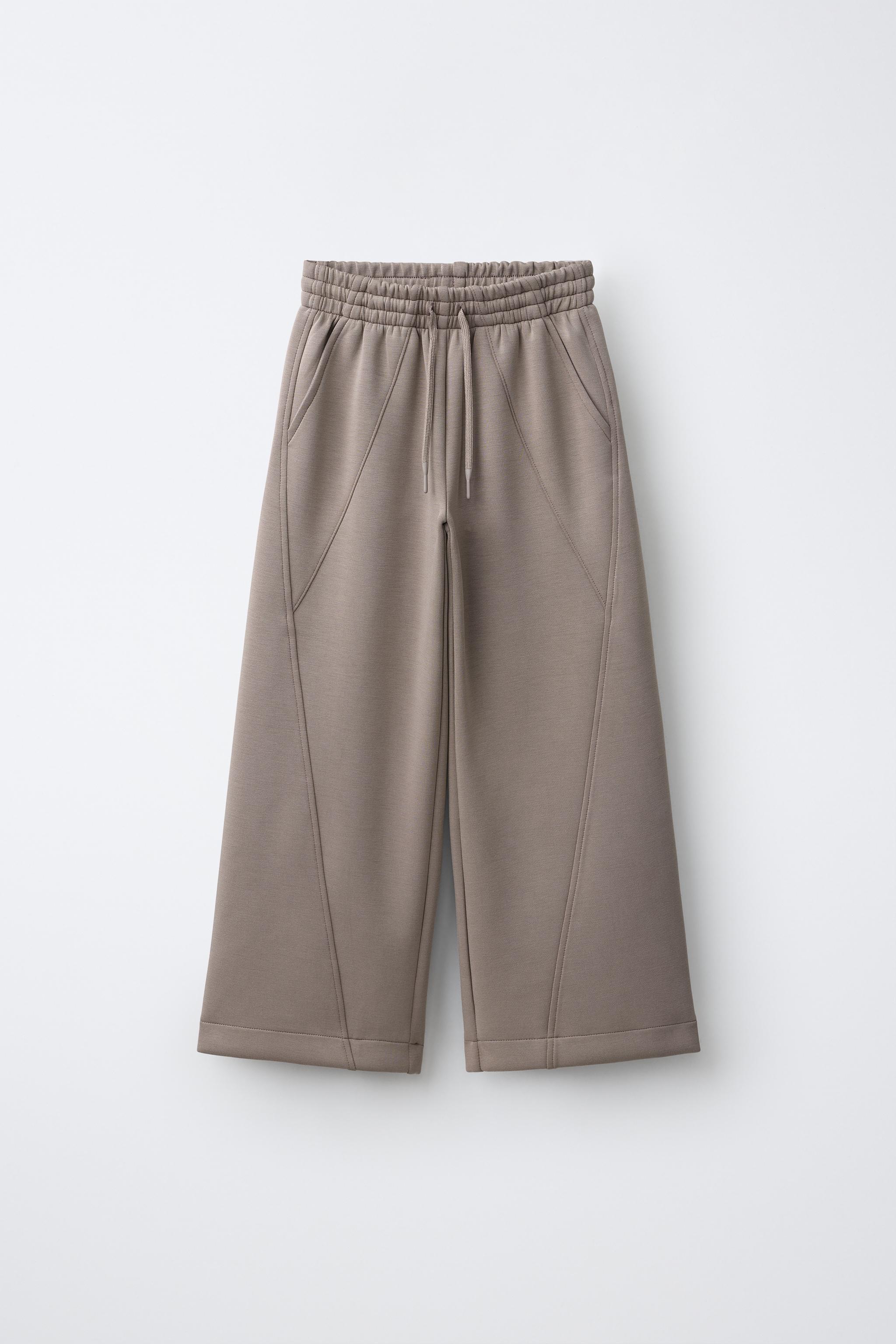 PANTALON SPORTY À JAMBES LARGES