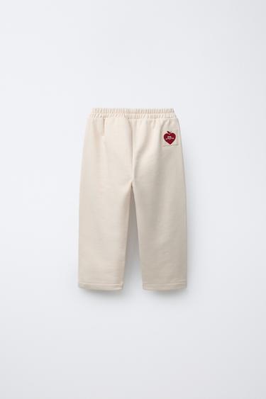 HÔTEL MAGIQUE © X ZARA STRAIGHT-LEG PLUSH TROUSERS - Beige by Zara - Image 1