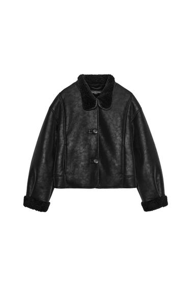 Front view of a black jacket with a funnel neck, long sleeves, front pockets and front button fastening.