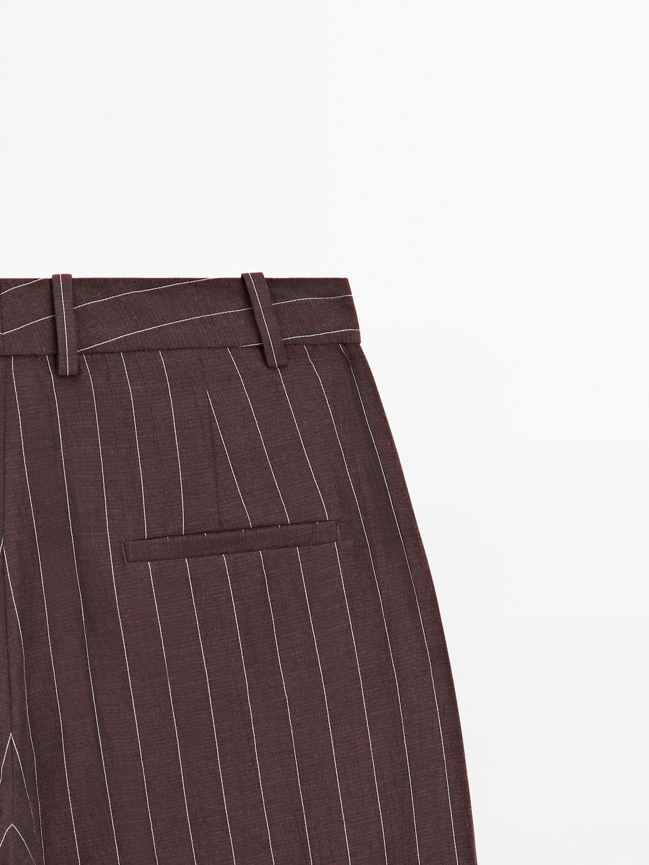 Darted pinstripe trousers
