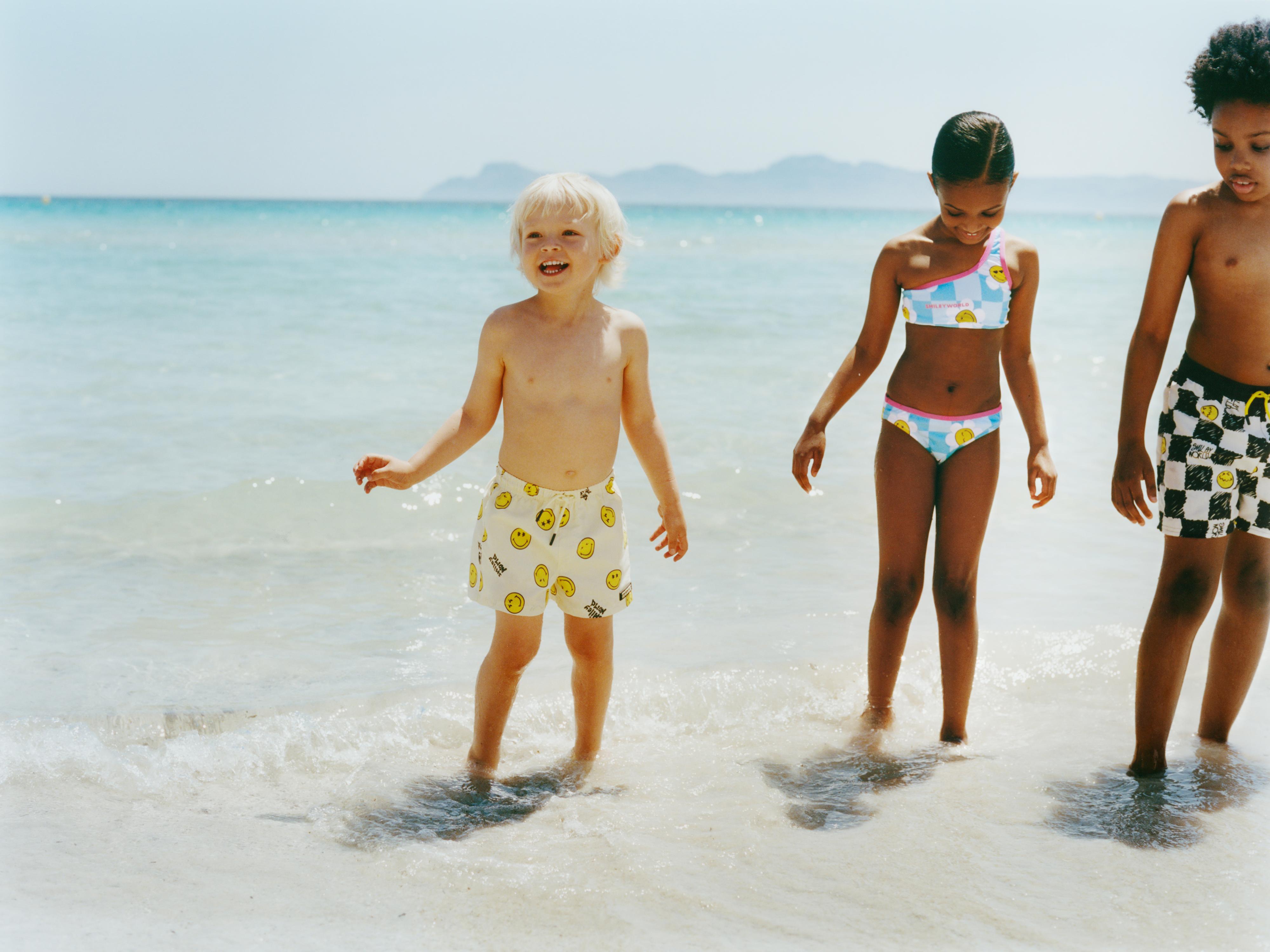2-6 YEARS/ SMILEYWORLD ® SWIM SHORTS — Light yellow