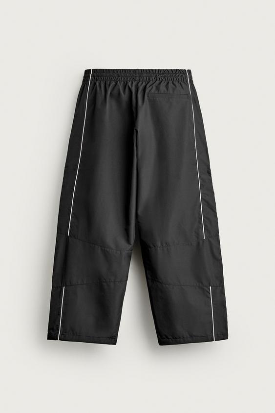 WATER-REPELLENT TECHNICAL TROUSERS WITH CONTRAST DETAILS - Black by Zara - Image 7