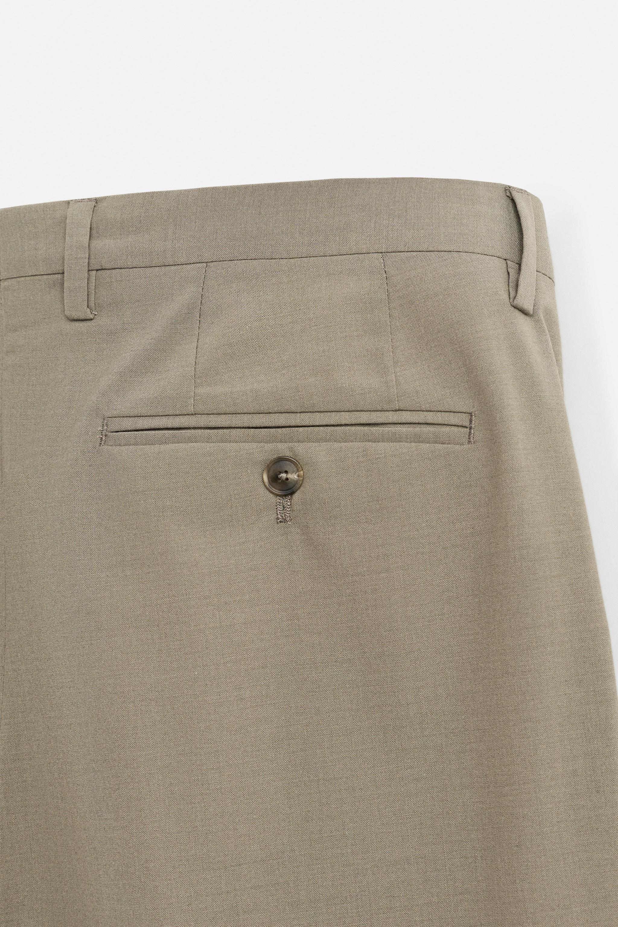 TEXTURED SUIT PANTS