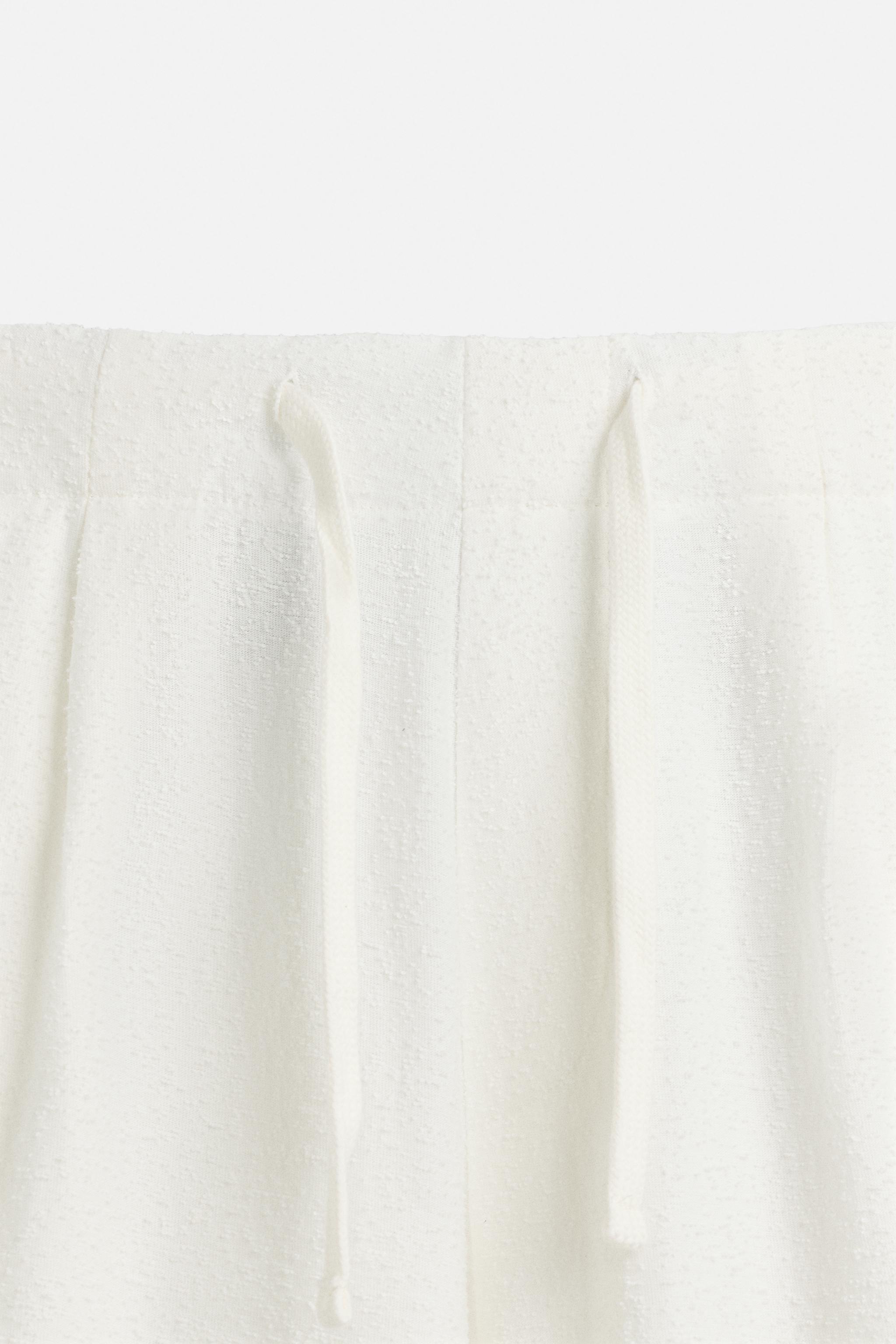 TEXTURED RELAXED FIT PANTS