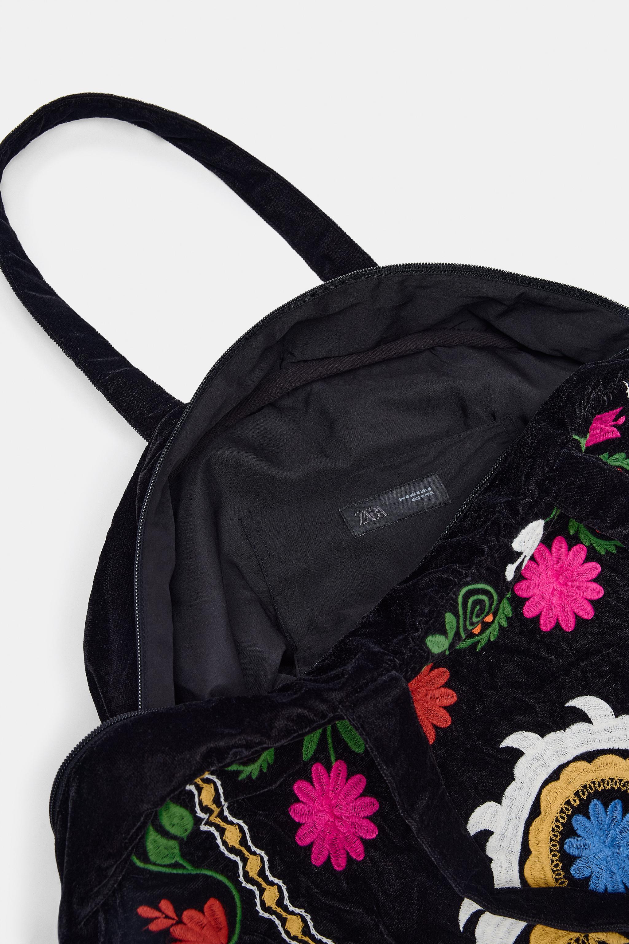 EMBROIDERED VELVET TRAVEL BAG