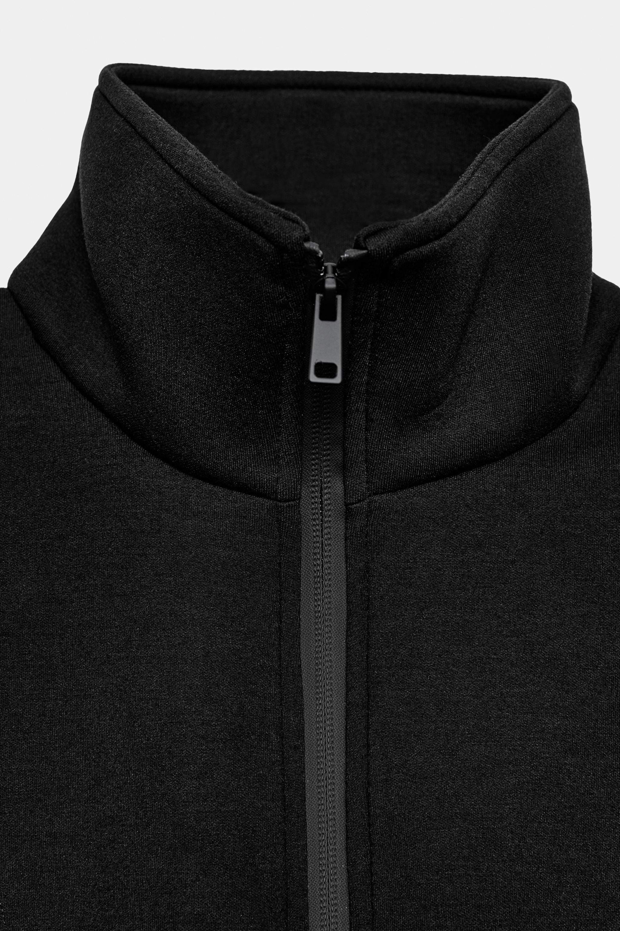 VESTE À ÉPAULETTES ET ZIPPÉE